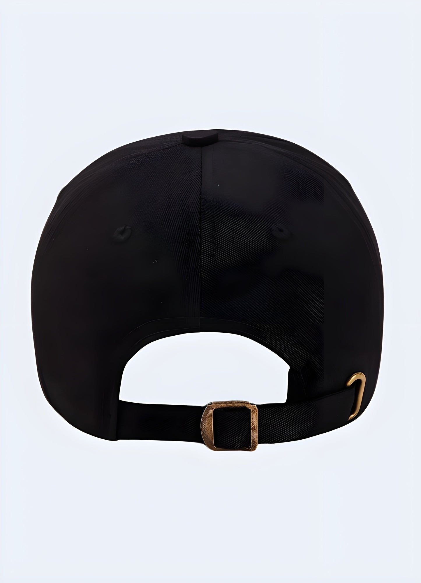 A black snapback cap with an alien-themed design, shown from the back side to highlight the adjustable strap and the subtle details of the cap's design.