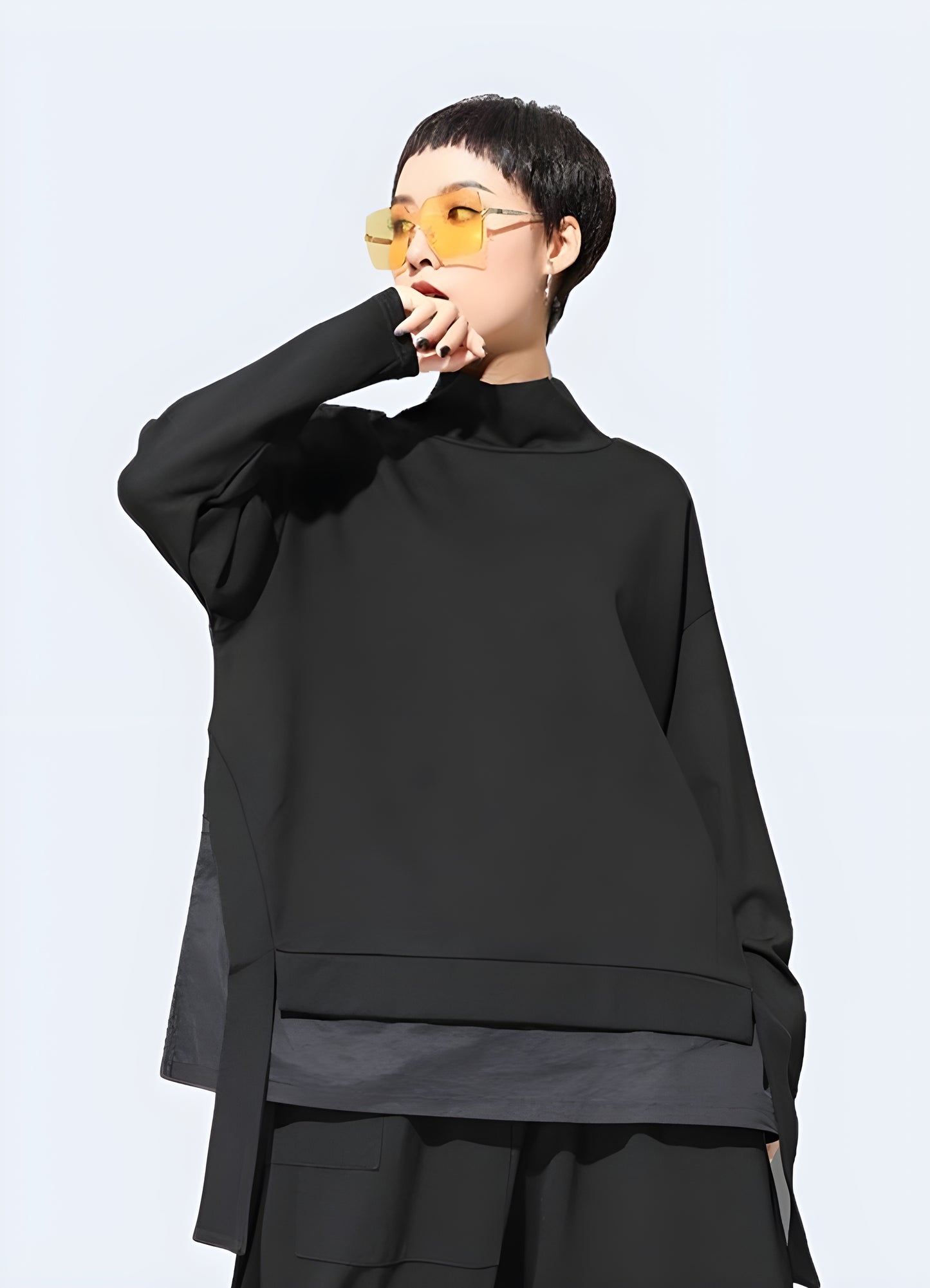 Asymmetrical sweatshirt in techwear style, available in Canada. Innovative design perfect for a modern, edgy look.