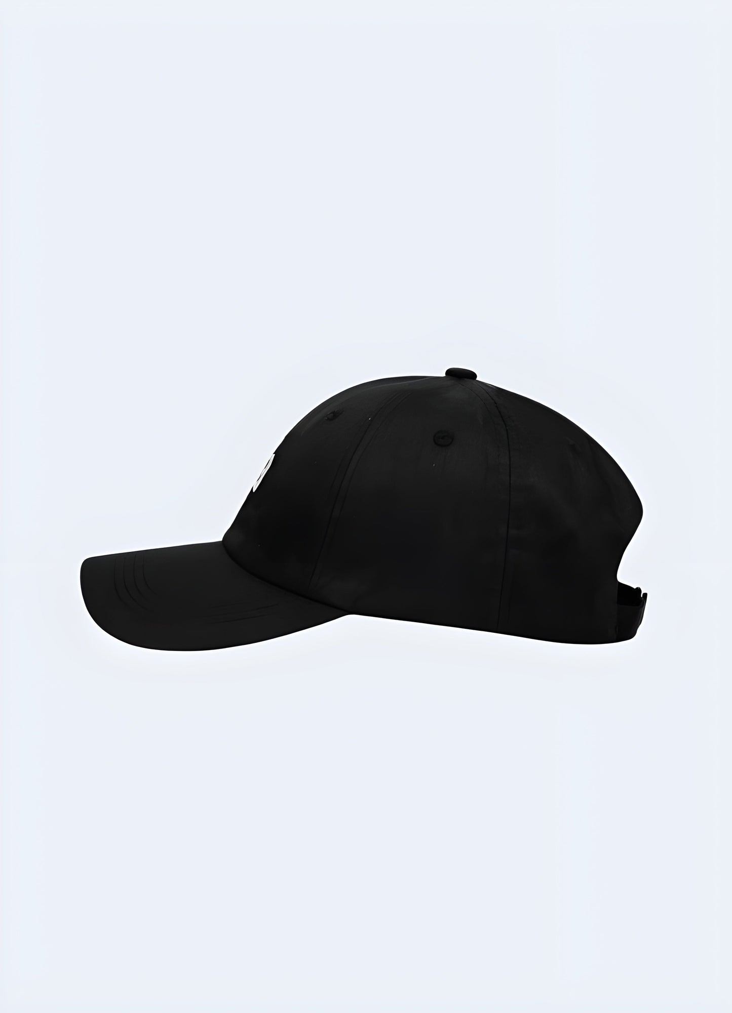 Side view of black Berserk manga cap, showcasing intricate artwork, in the Canada.