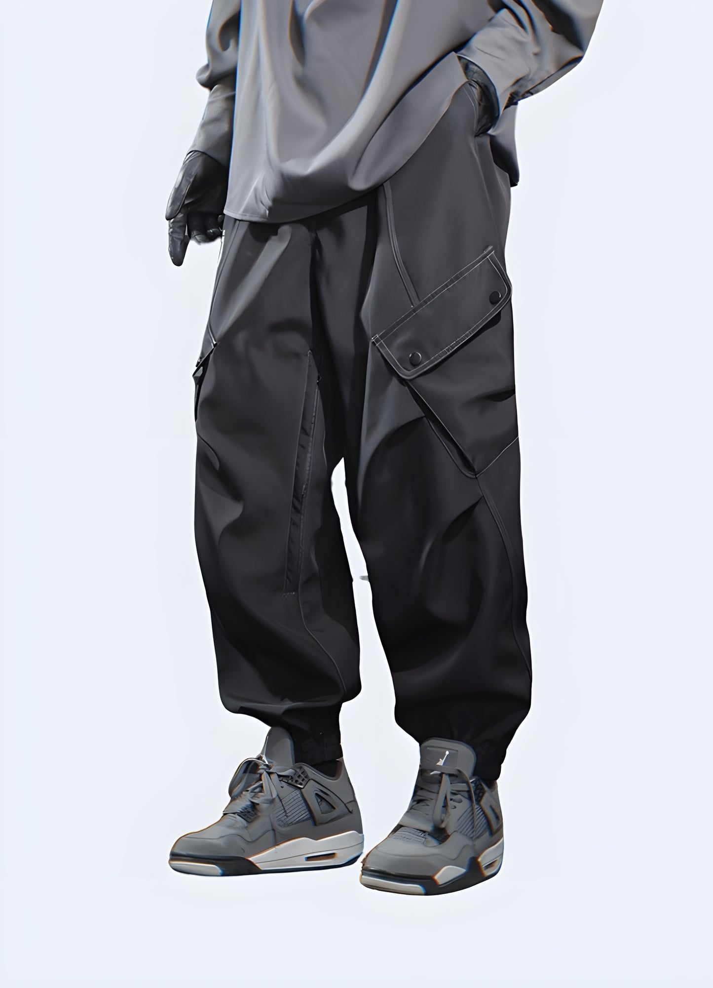 Dark grey cargo pants, urban techwear street fashion.