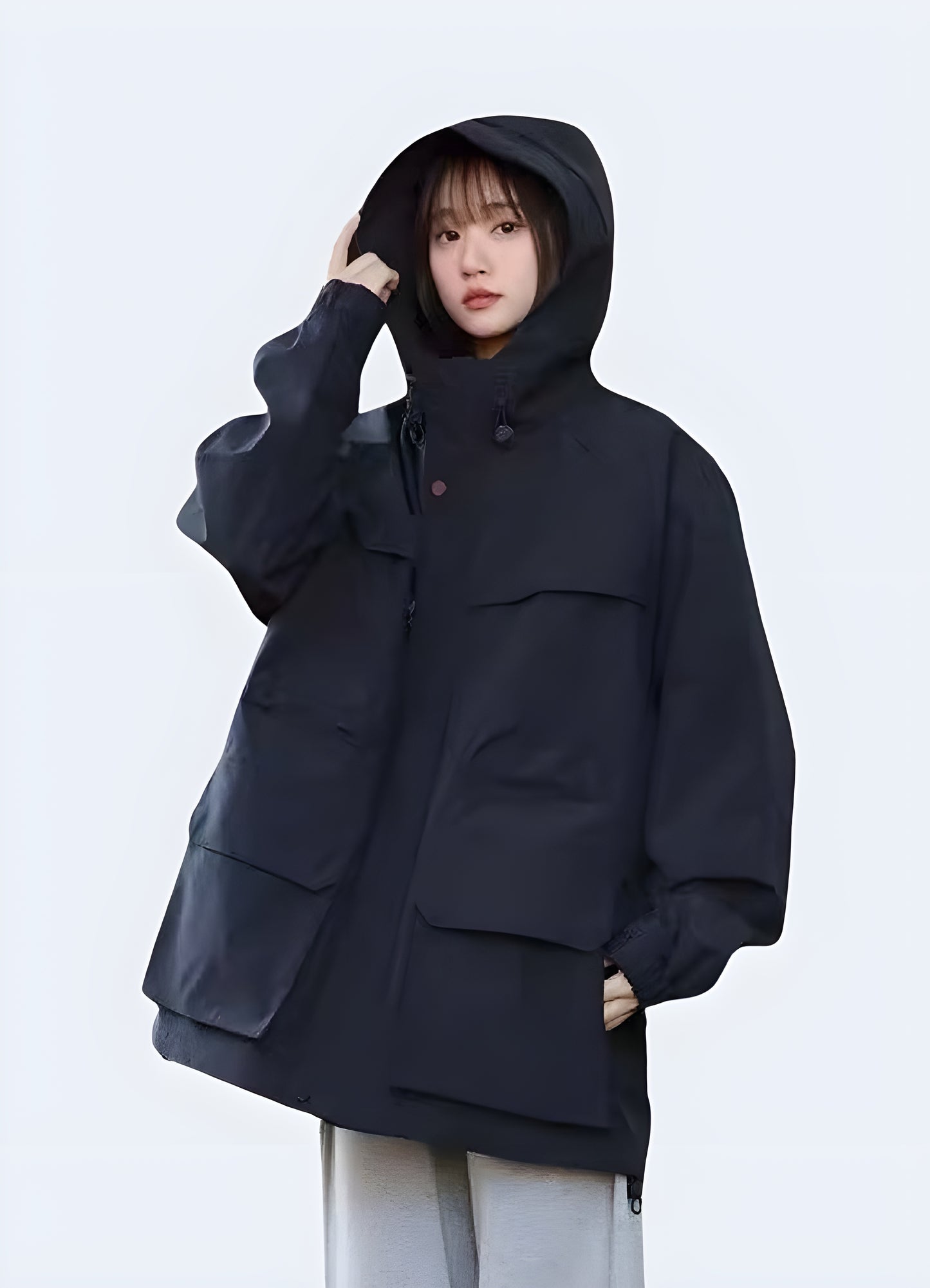 Front view of a hooded cargo jacket highlighting its practical design, spacious pockets, and versatile style, perfect for tackling Canada's urban adventures and everyday challenges.