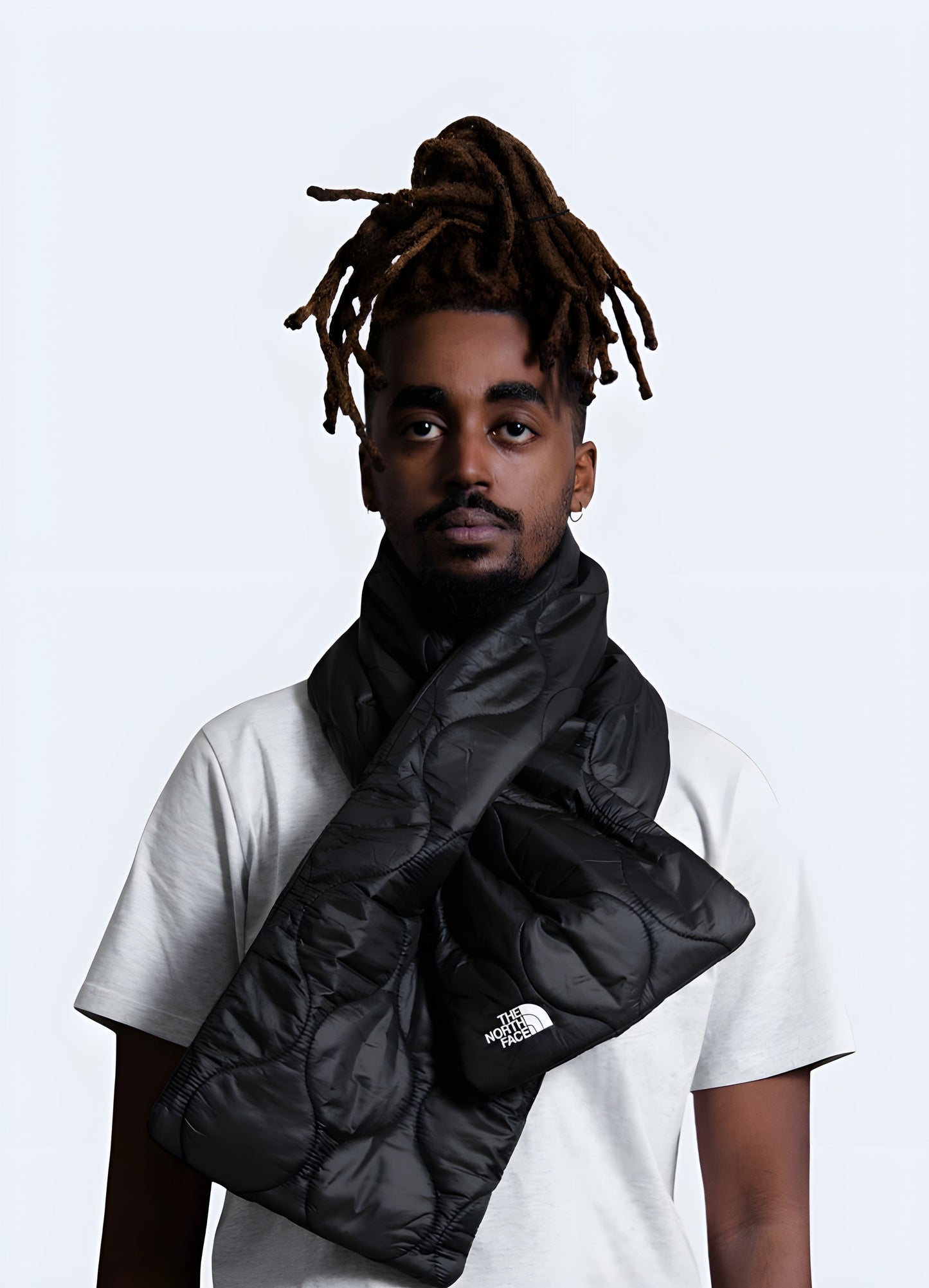 This scarf features a sleek, modern aesthetic with a high-performance insulated fabric that provides excellent warmth and comfort Canada.