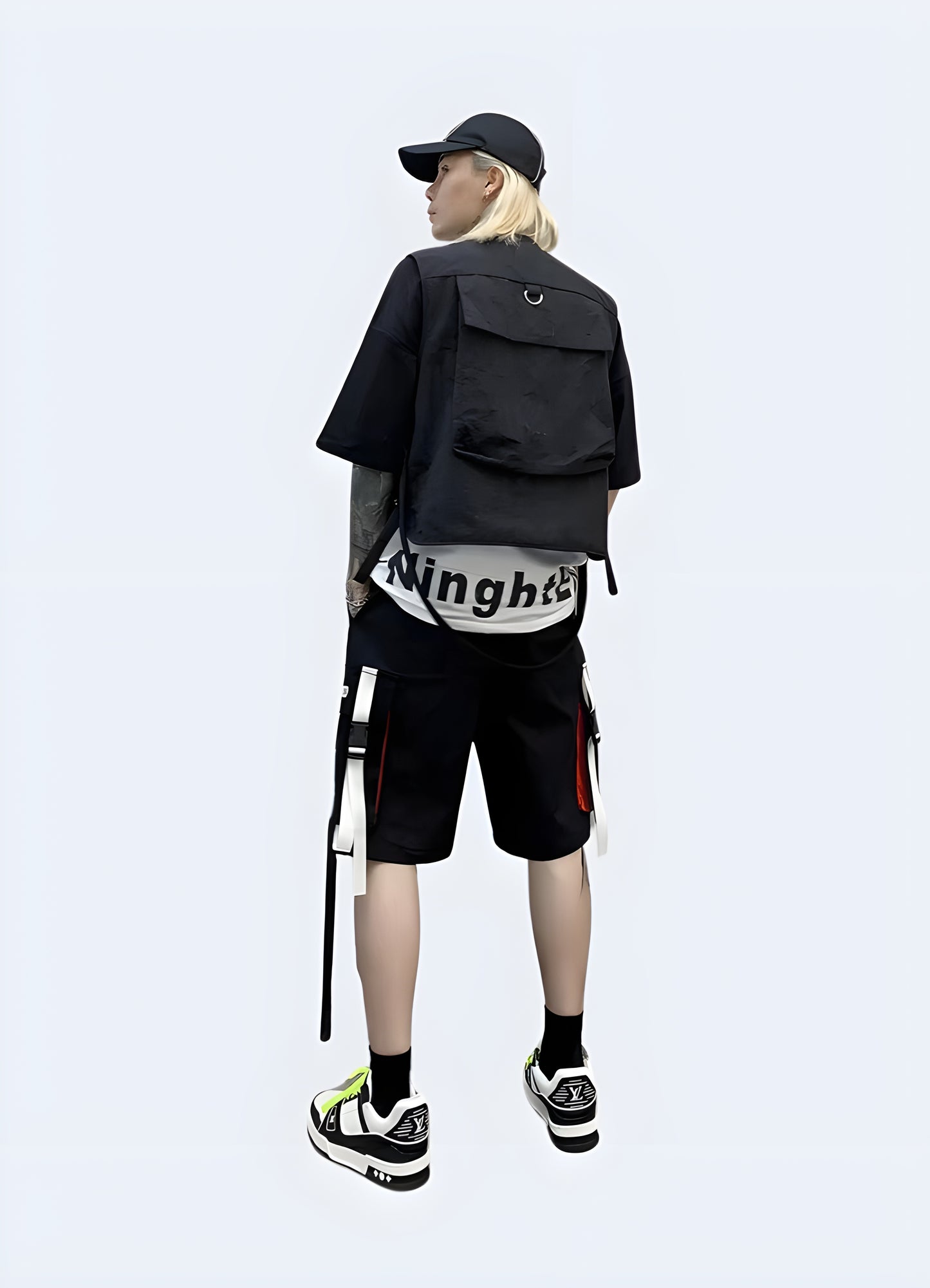 Back view of a man wearing black and white cargo shorts, highlighting the versatile style and practical pockets, ideal for everyday wear in the Canada.