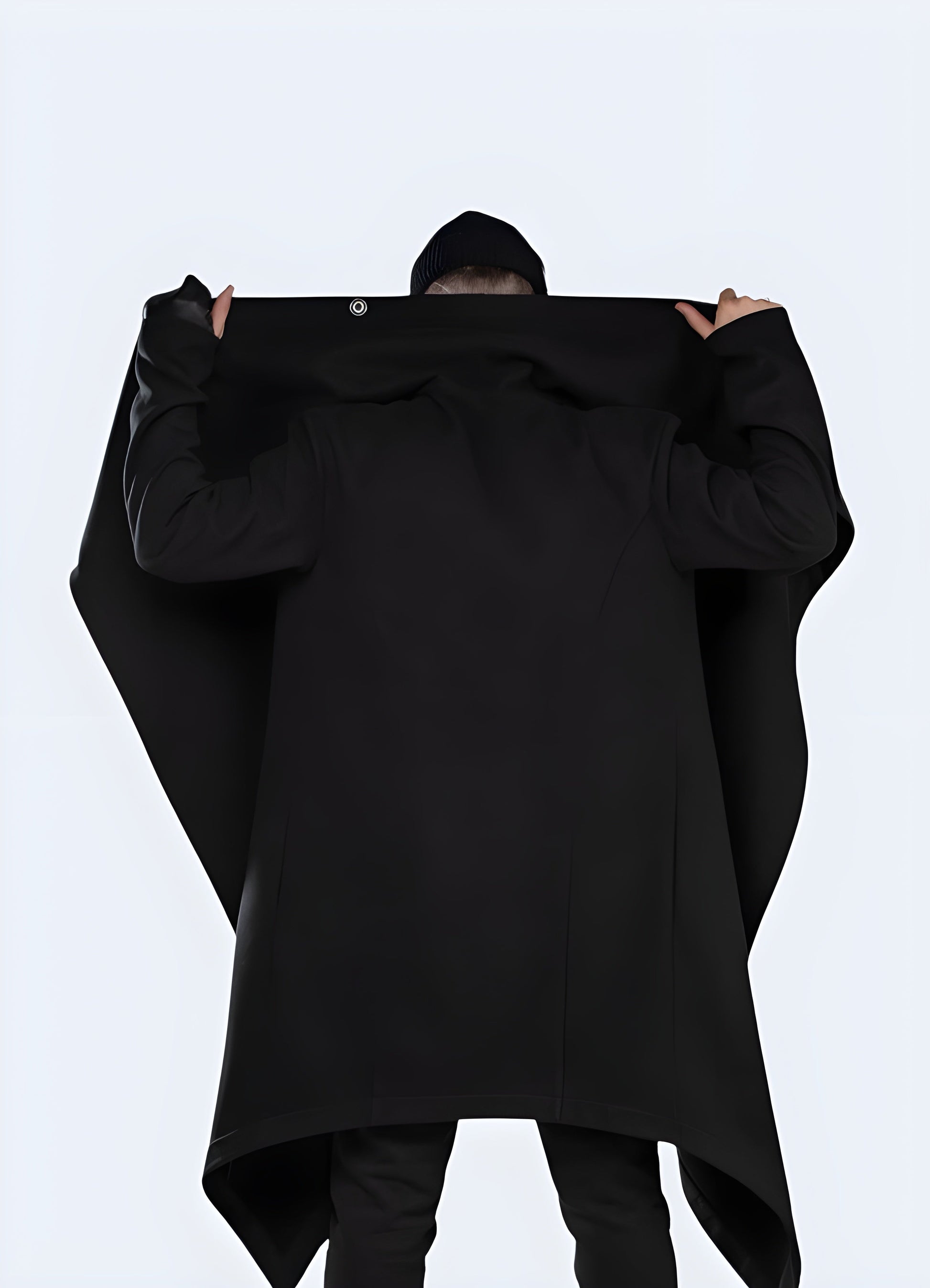 Back view of a man wearing a black cyberpunk cloak, showcasing its edgy and dystopian-inspired style for a bold fashion statement in the Canada.