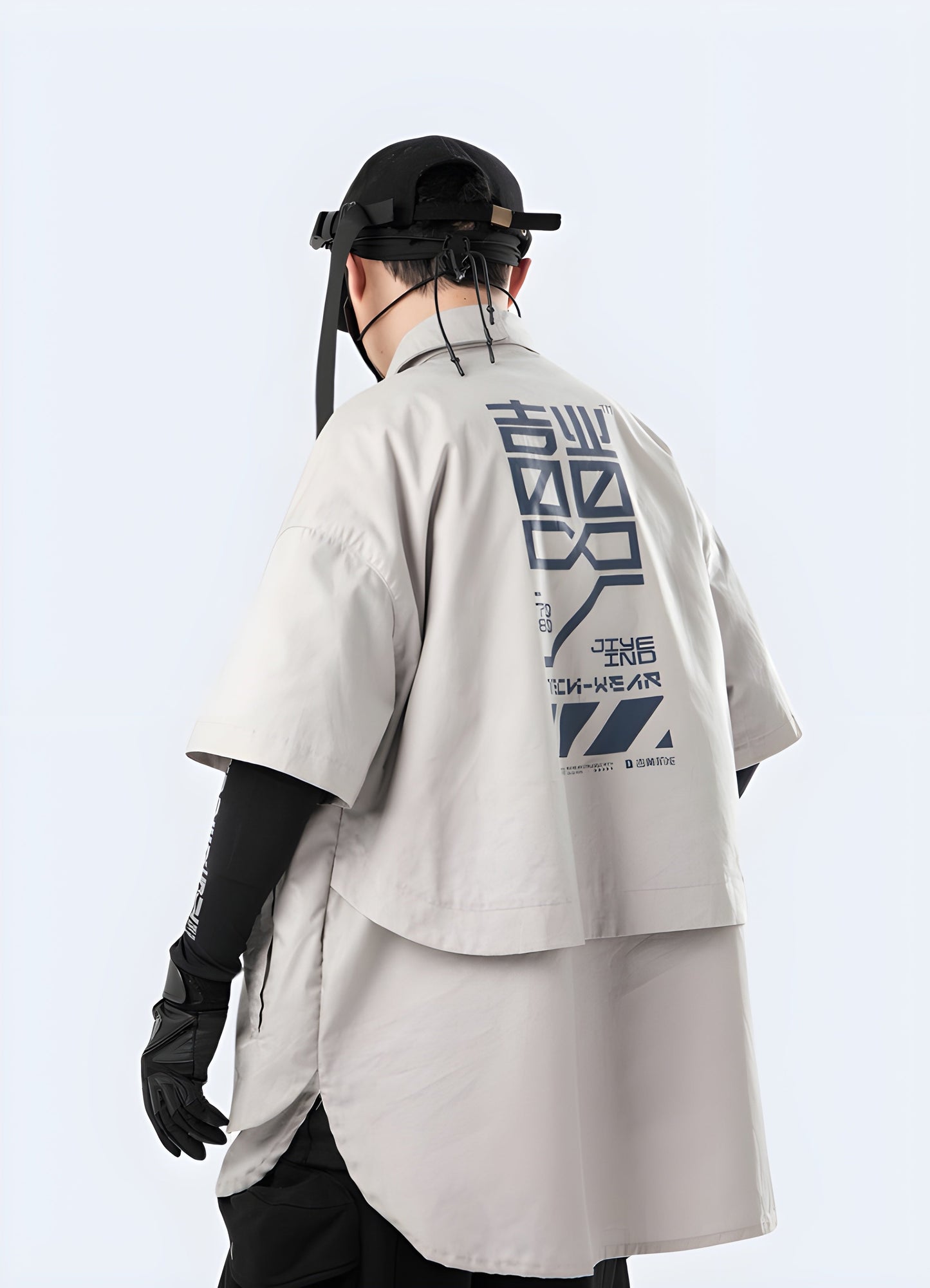Side and back view of a man sporting a cutting-edge cyberpunk kimono with black and red accents, photographed in the Canada setting.
