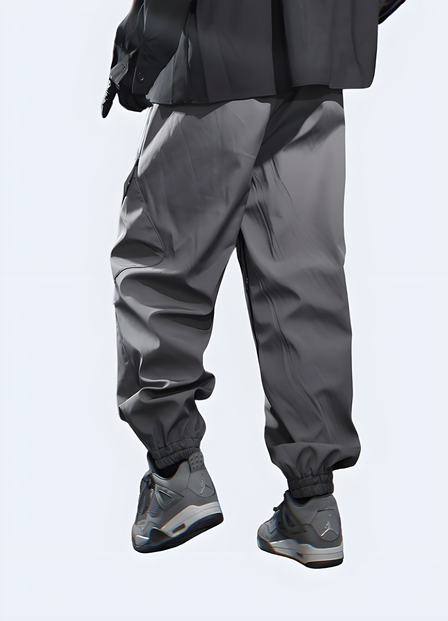 Rear view of a man wearing dark grey cargo trousers, showing the rear cut and pocket location of the garment.