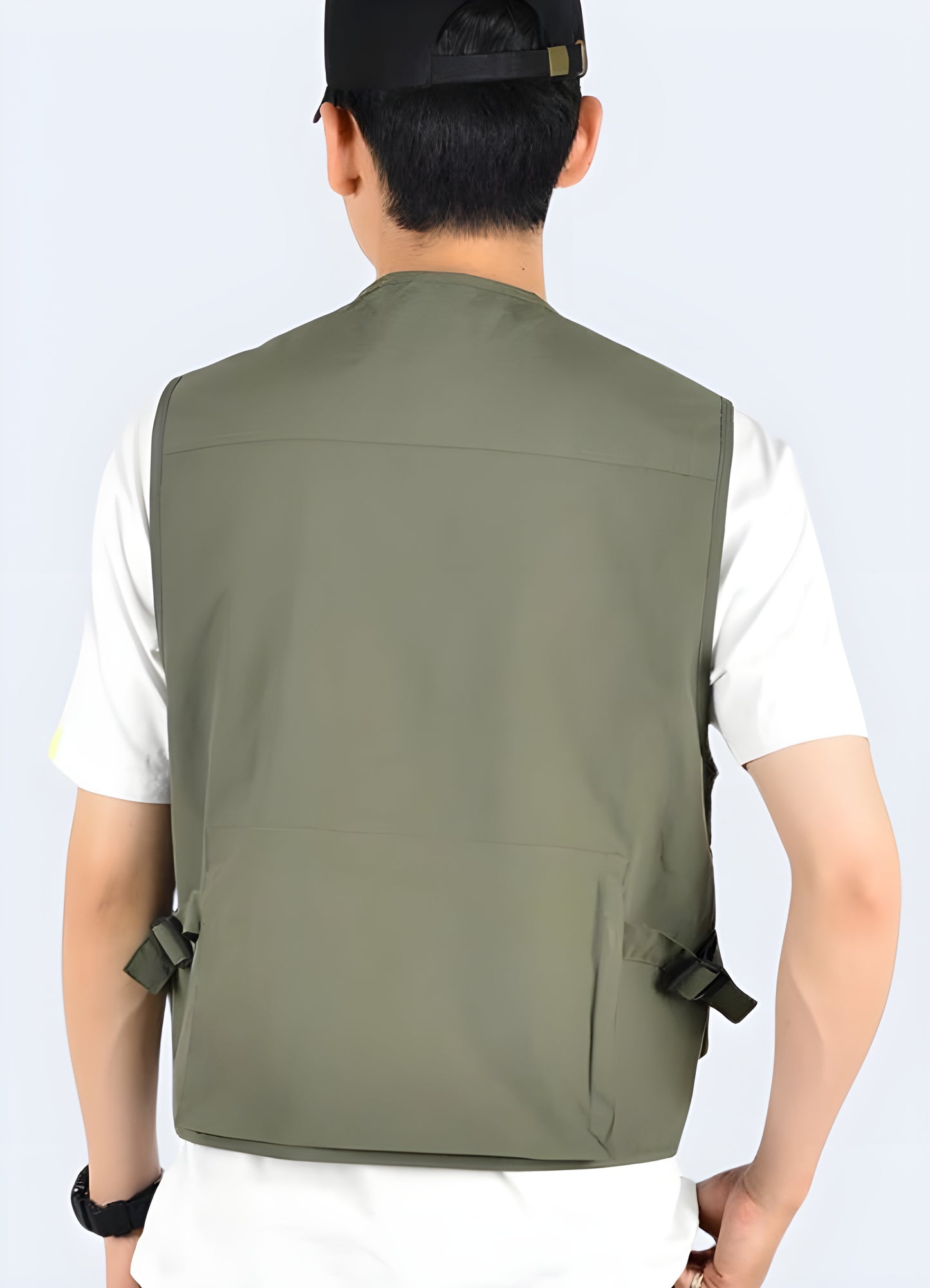 A Gorpcore sleeveless vest in green khaki, front view, showcasing its stylish and functional design, available in Canada.