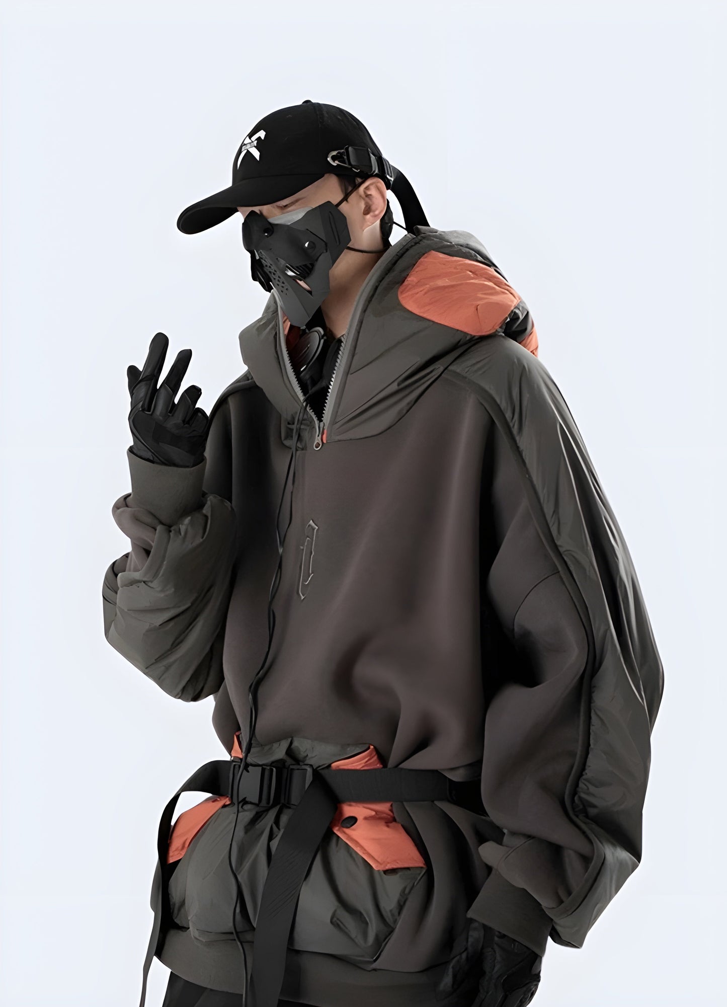 Man wearing Japanese streetwear hoodie, front and side view, available in Canada, showcasing its contemporary look and fit.