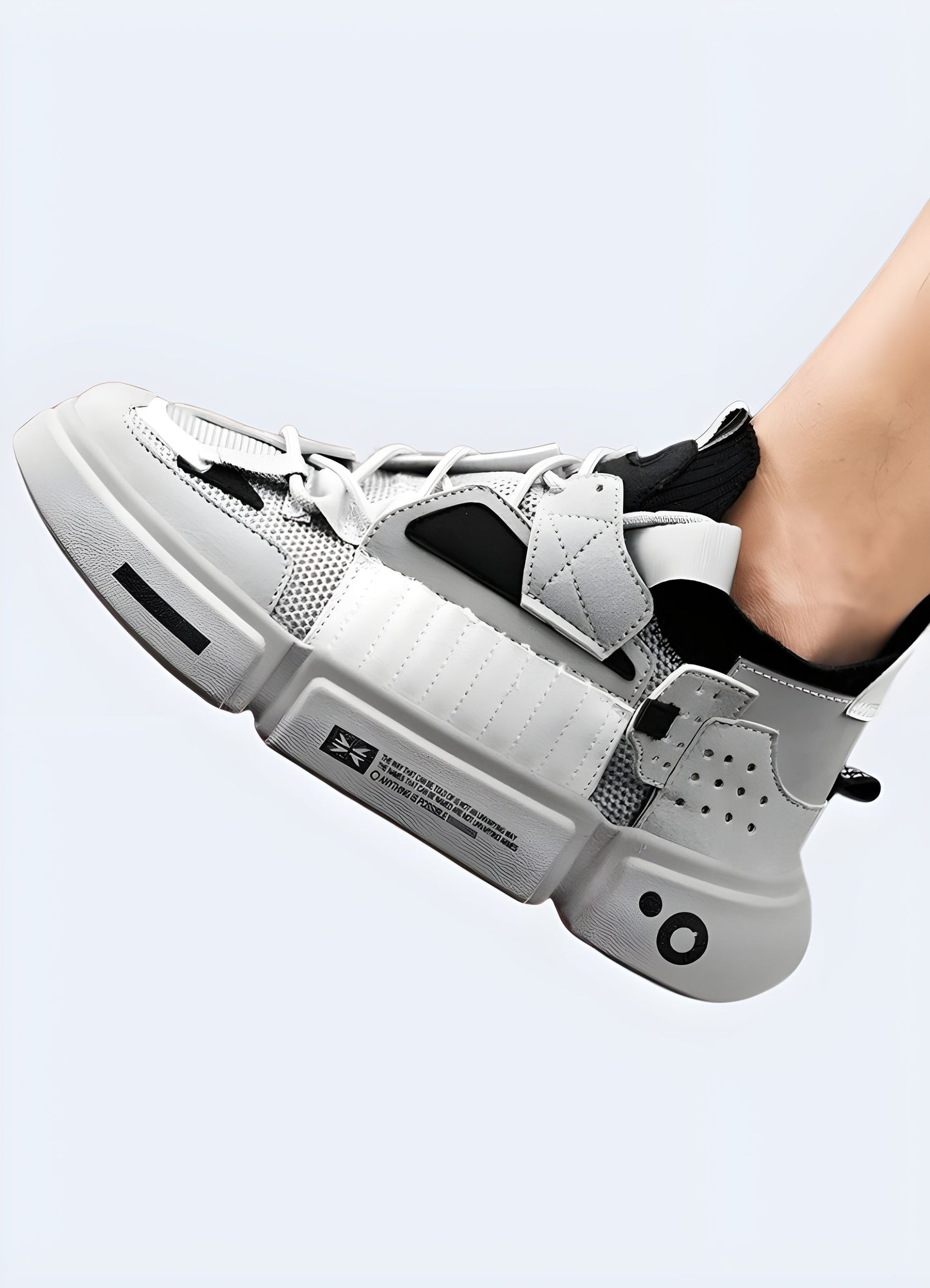 Man wearing lunarcore shoes while posing, demonstrating the shoes' comfort, style, and futuristic aesthetics for fashion-conscious consumers in the Canada.