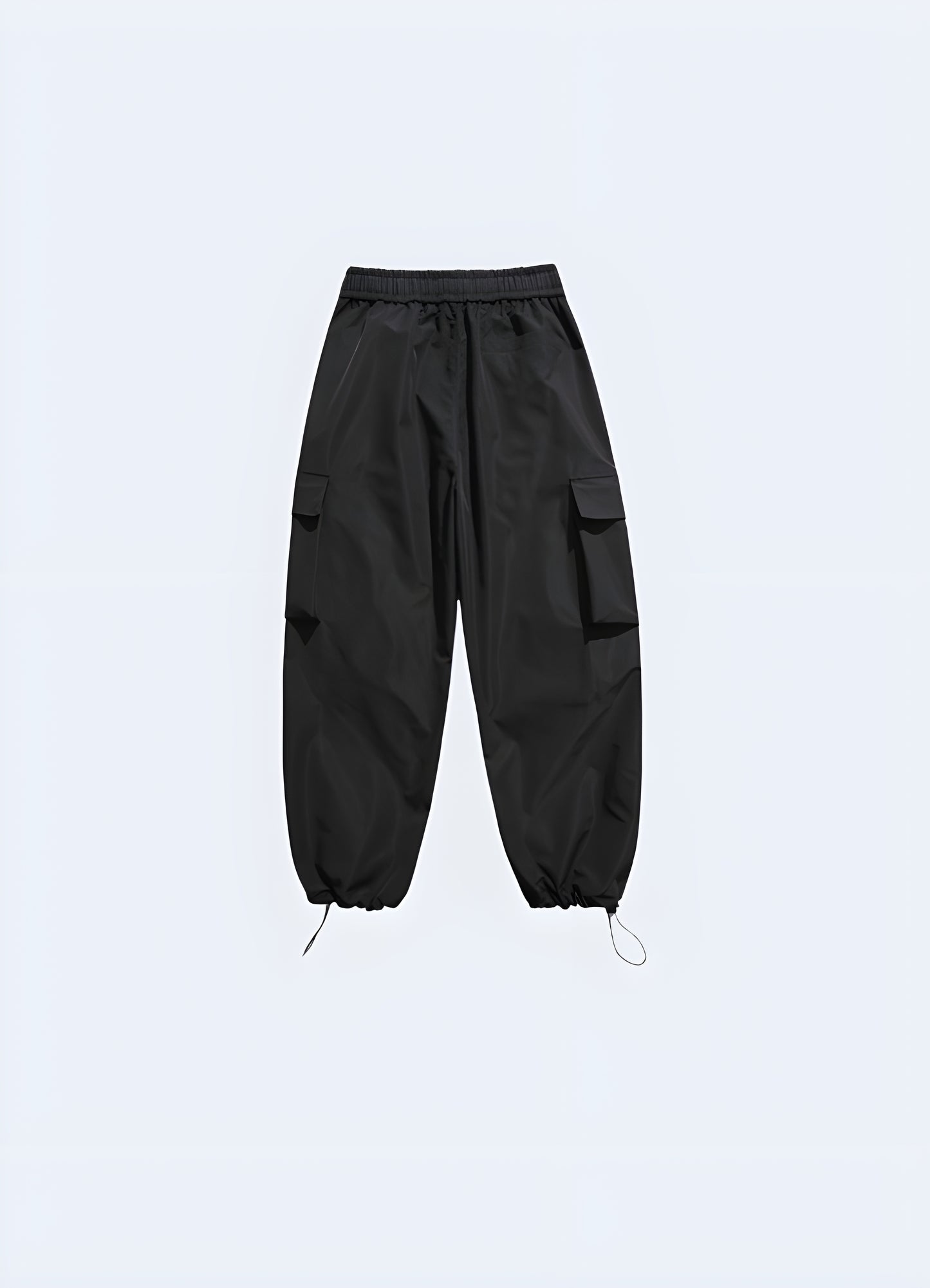 Back view of a man modeling fashionable urban cargo pants, showcasing the garment's contemporary design and utility-inspired features, ideal for fashion-forward individuals in the Canada.