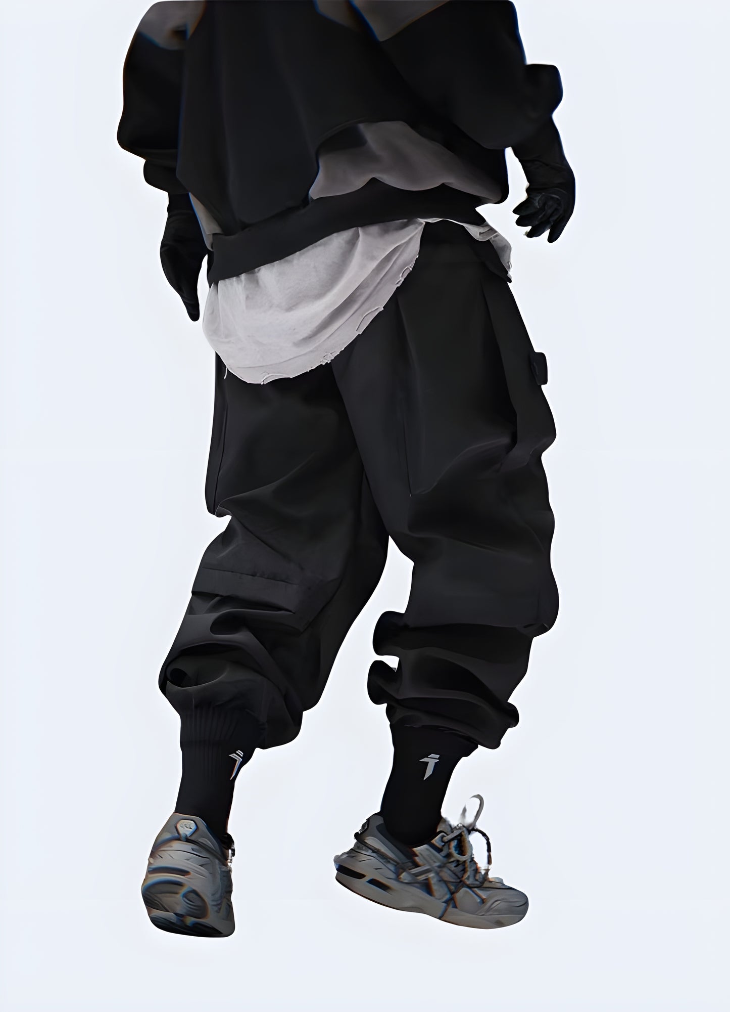 Back side view of a man modeling fashionable urban cargo pants, showcasing the garment's contemporary design and utility-inspired features, ideal for fashion-forward individuals in the Canada.