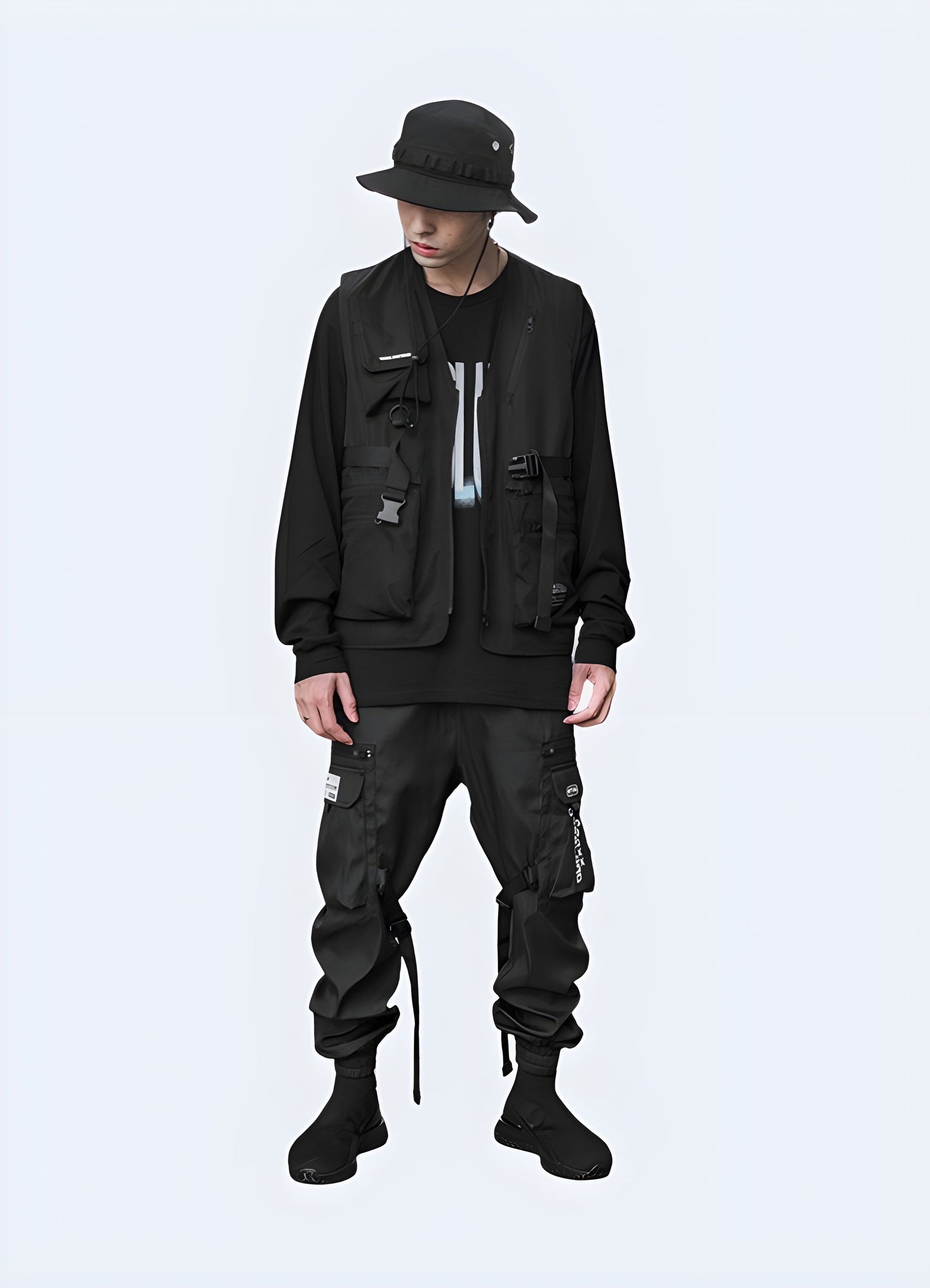 Man wearing a streetwear tactical vest, full body front view, highlighting its modern aesthetics and versatility for Canada streetwear enthusiasts.