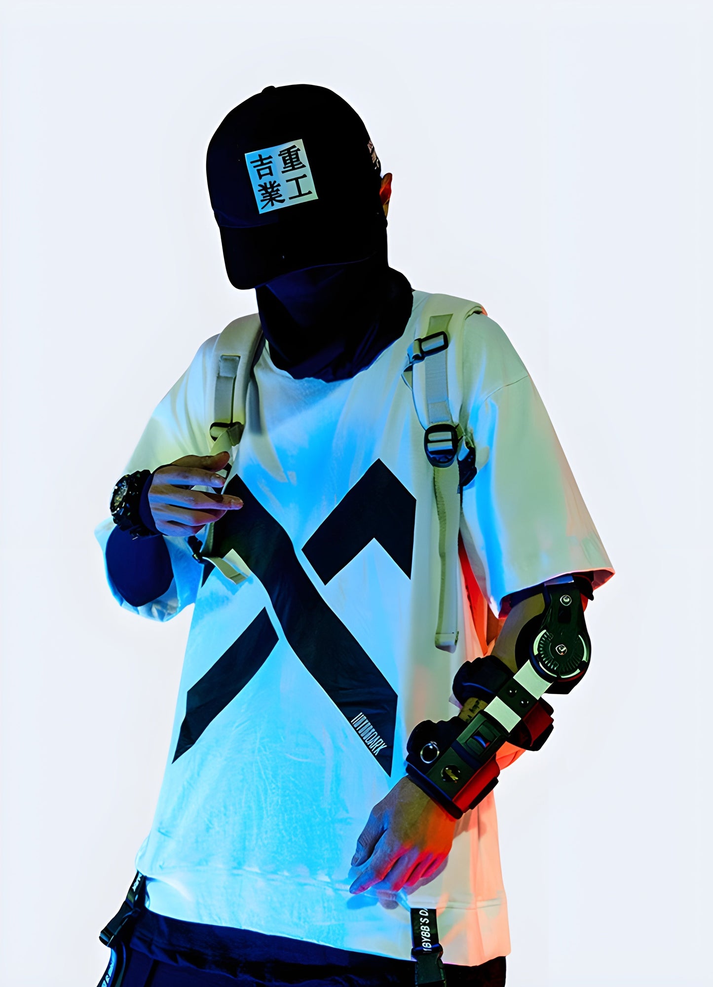 Front view of a man sporting a white X t-shirt, emphasizing its clean and stylish design for a fashionable look in the canada.
