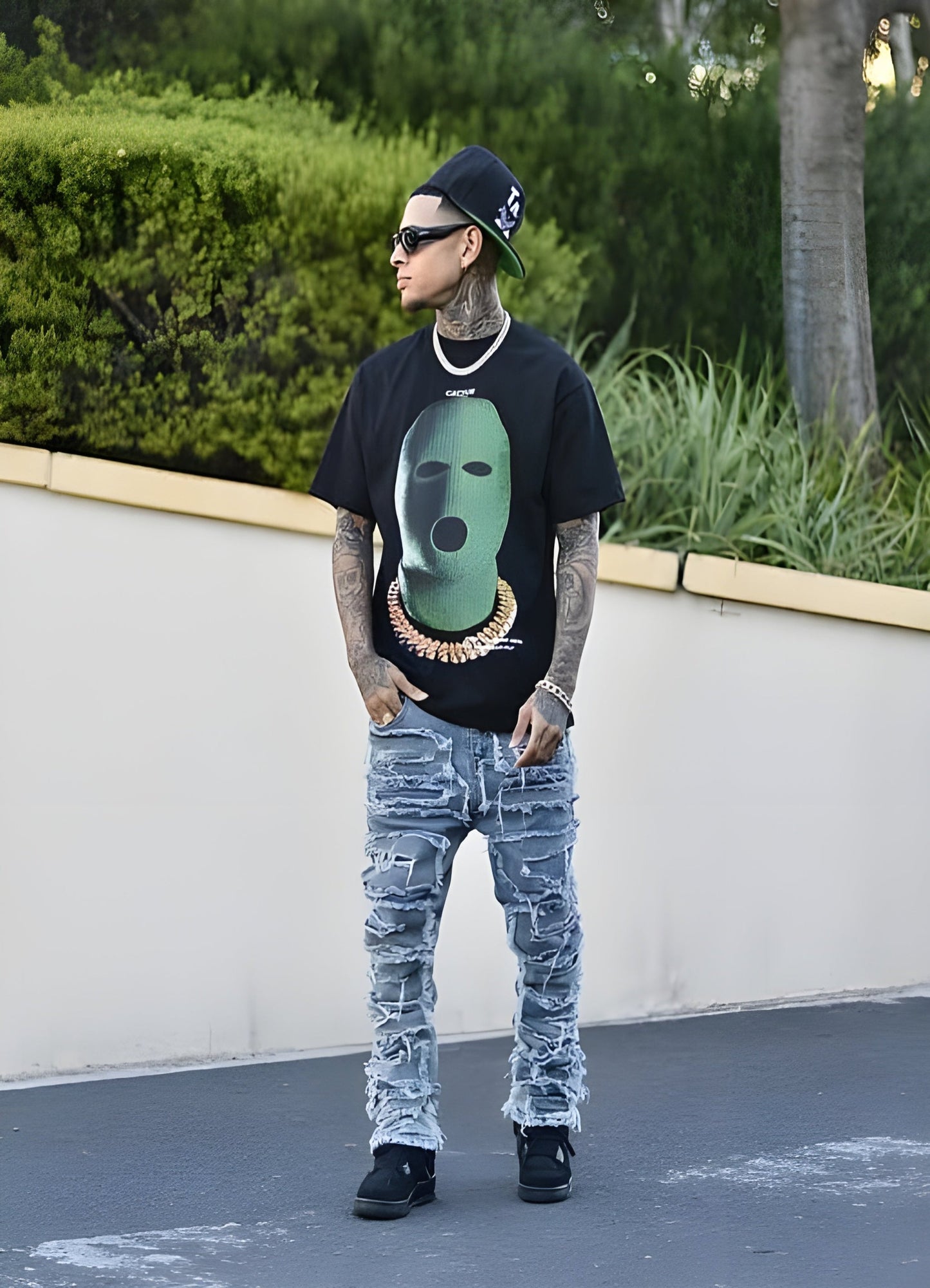 The shirt's unique design stands out against the natural backdrop.