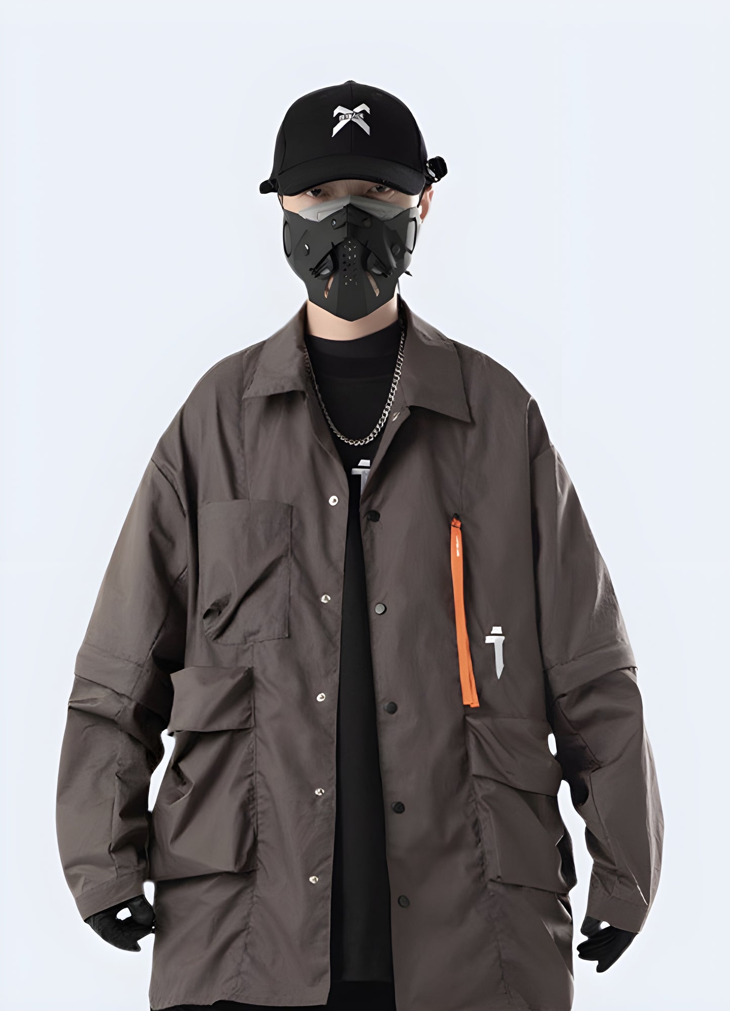 Man wearing a brown techwear shirt jacket, front view, designed for autumn in Canada.