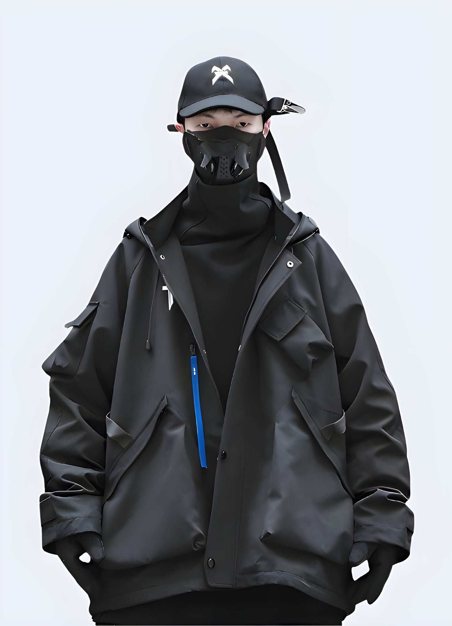 Front view of a man wearing a sleek black techwear rain jacket, showcasing its functional design and urban style for Canadian city dwellers.