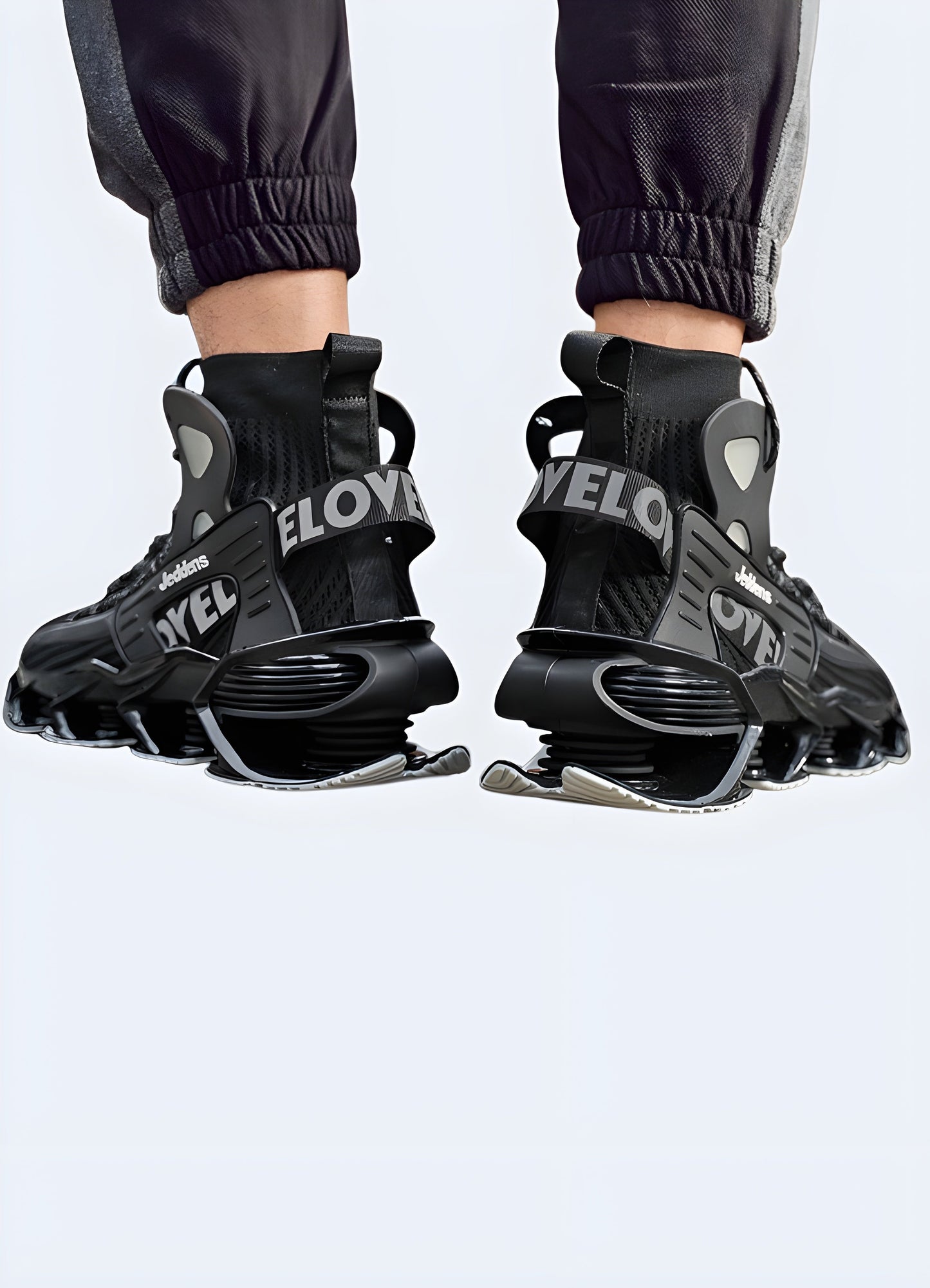 Back view of men wearing techwear walking shoes in the Canada. Comfortable and modern footwear.
