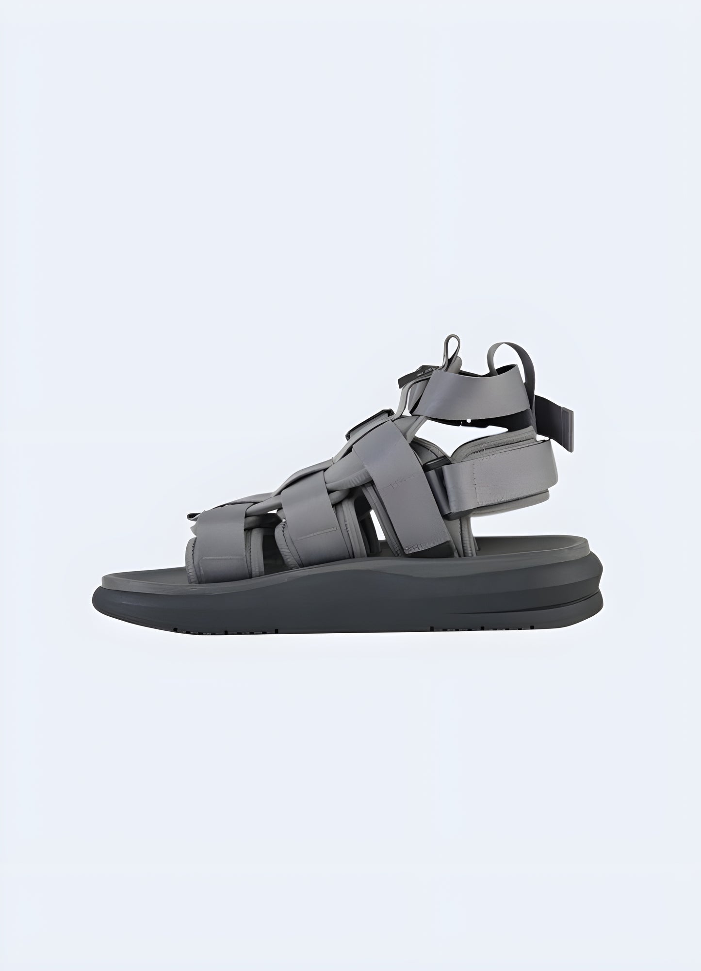 Modular techwear sandals side view available in Canada, showcasing their innovative design and adjustable features. Model wearing modular techwear sandals side view in Canada, demonstrating their ergonomic fit and stylish appeal.