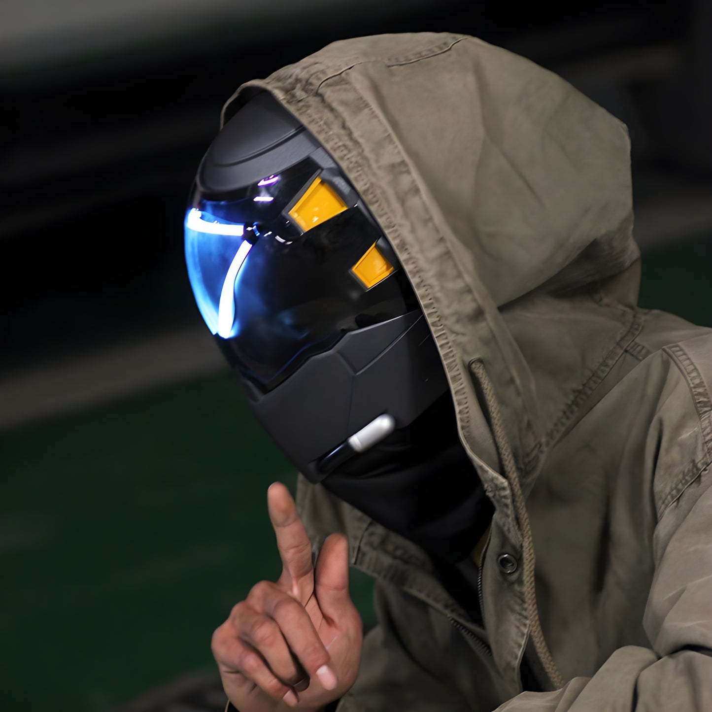 Neon LED techwear mask featuring vibrant illumination and a sleek, futuristic design. Ideal for enhancing your tech-inspired style with eye-catching lights.