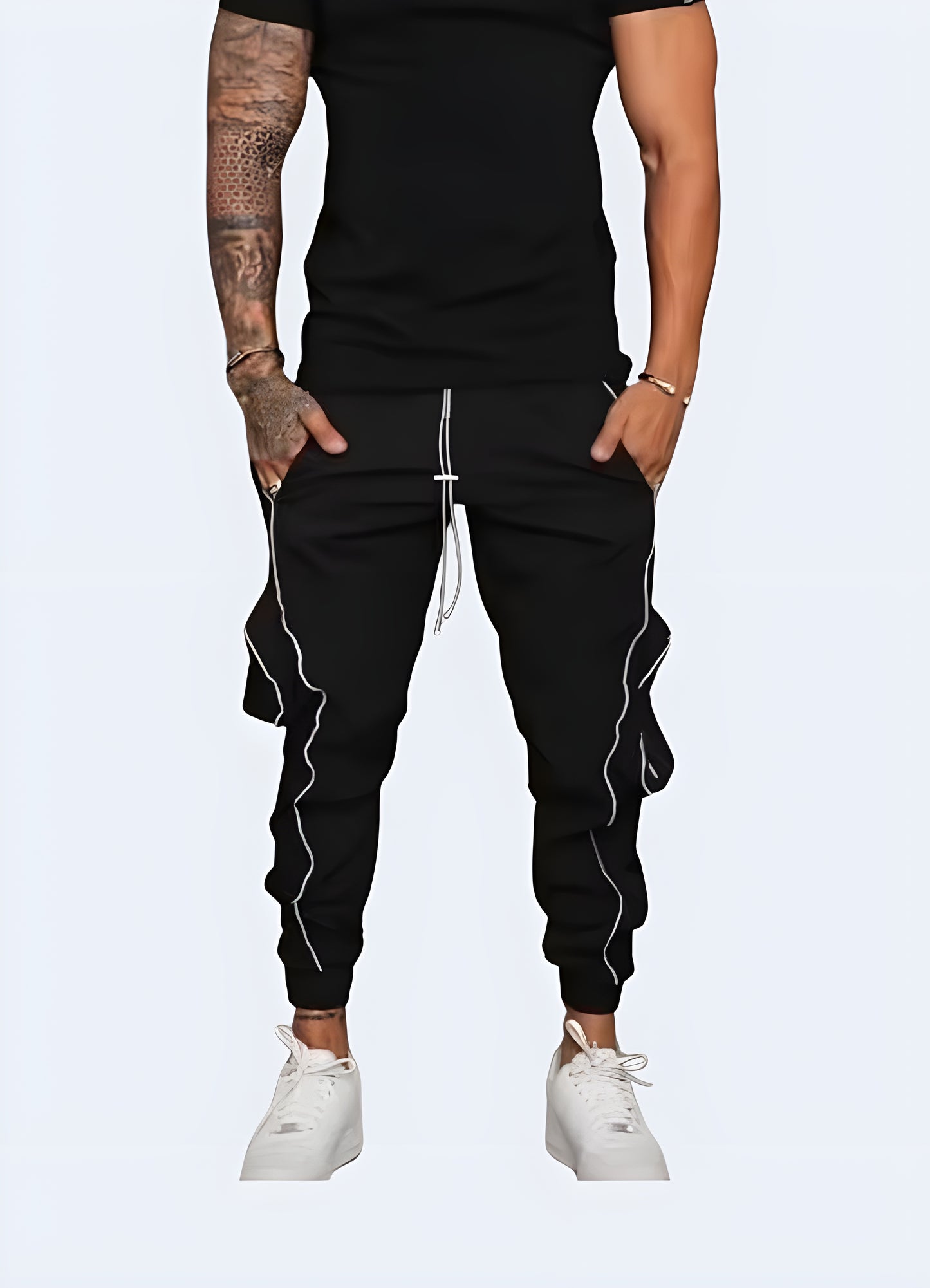 Man wearing black reflective cargo pants – Front view | Techwear reflective cargo trousers for futuristic urban style – Canada