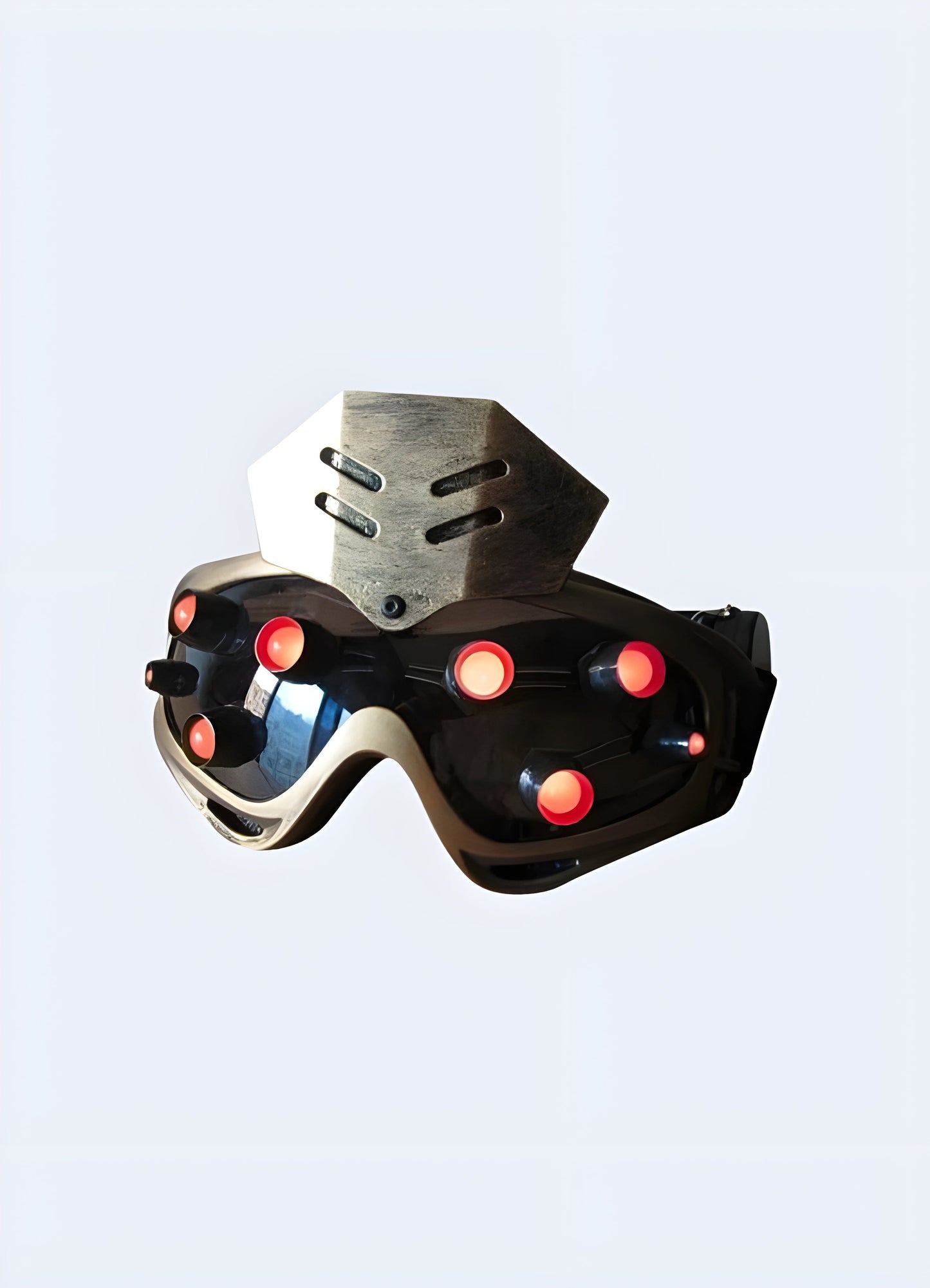 Front side view of a gold sci-fi cyberpunk mask with a red shield. Merges a high-tech aesthetic with striking hues Canada.