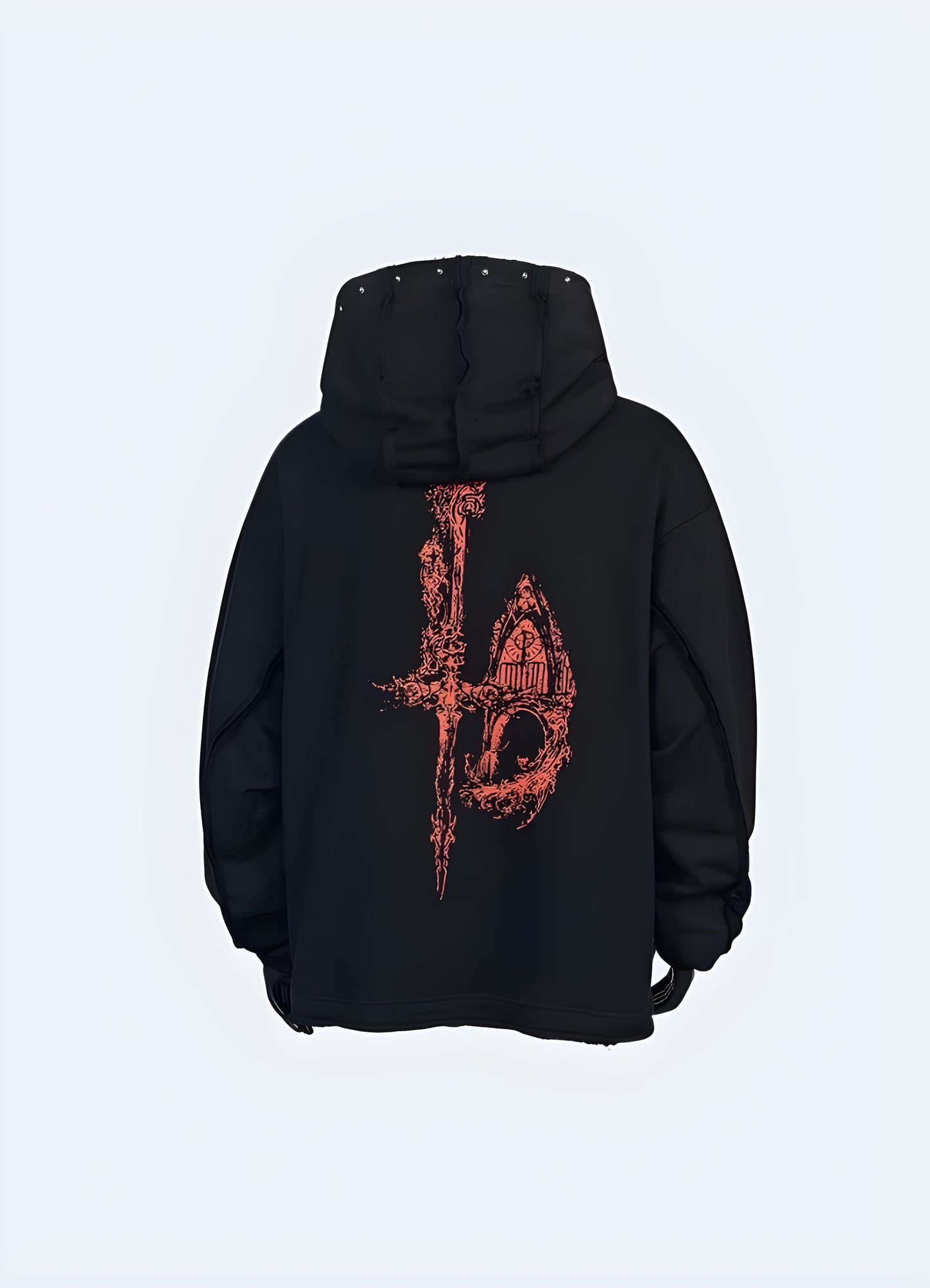 Back view of a person in a black hoodie with a white skull design, standing with their hands in the pocket.
