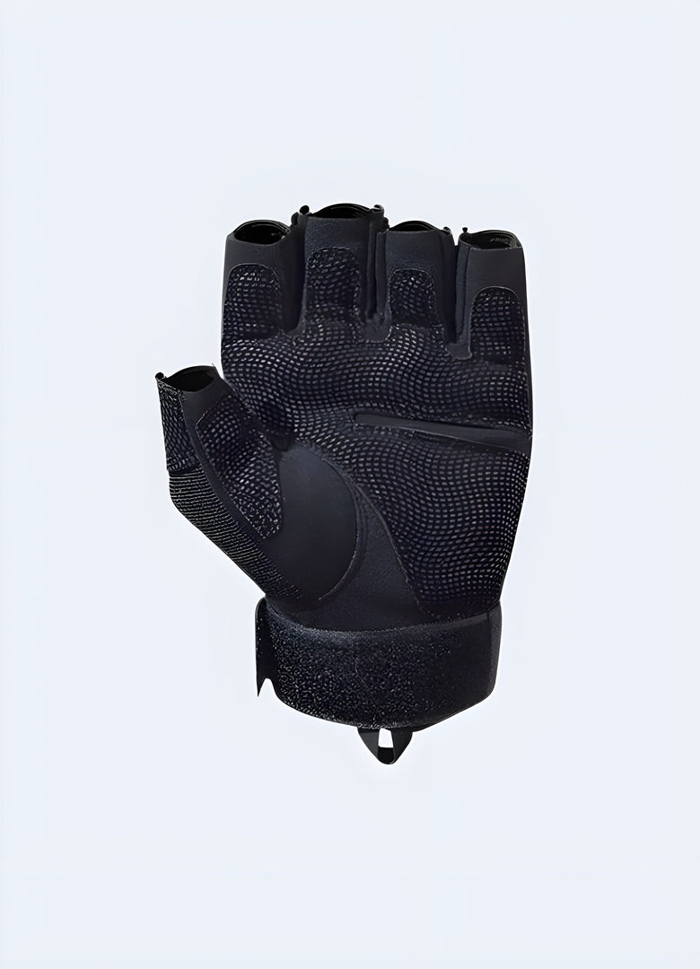 Inside view of fingerless techwear gloves highlighting the ergonomic padding and adjustable wrist strap for a secure fit Canada.
