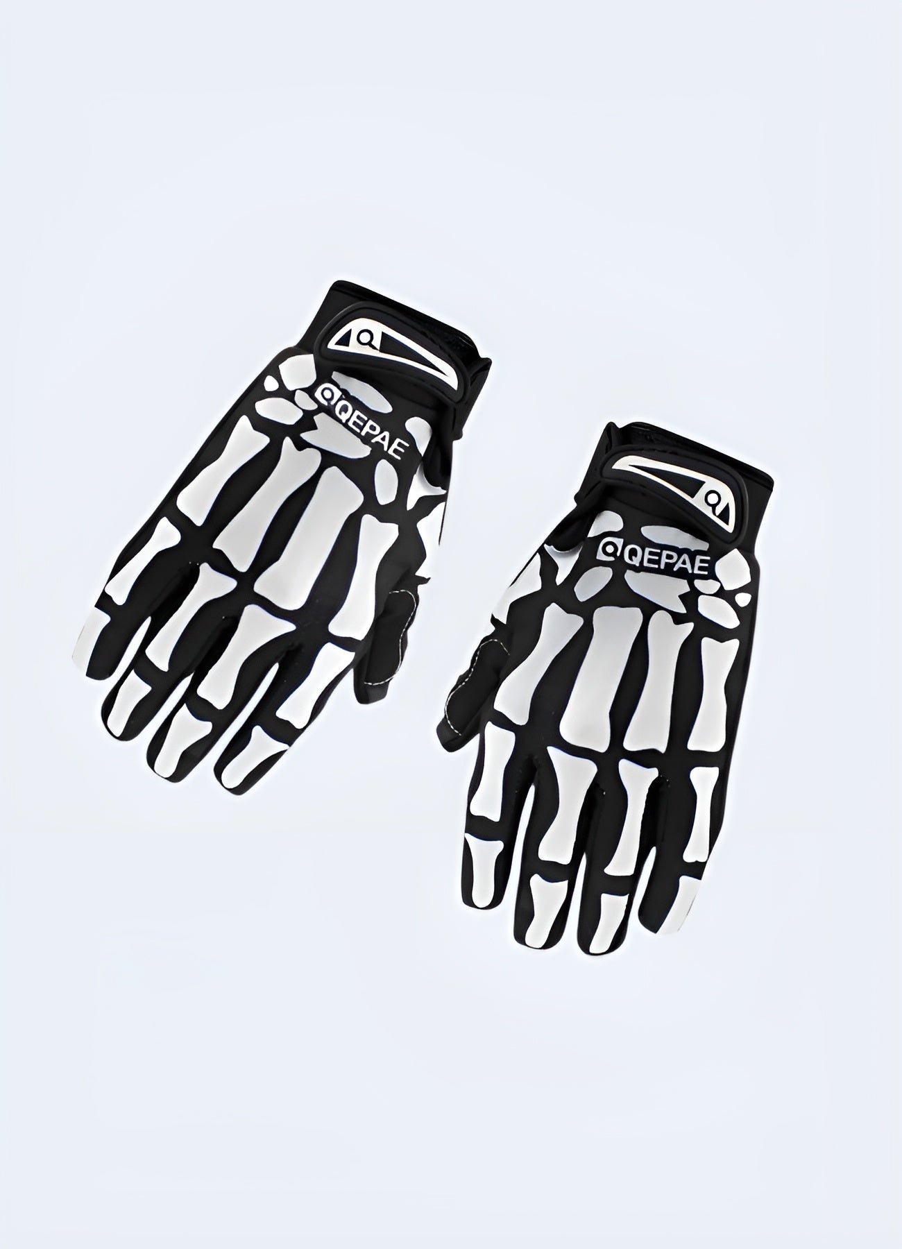 A pair of black tactical gloves featuring a skull design on the back of the hands. The gloves appear to be made from durable material suitable for combat or tactical use Canada.