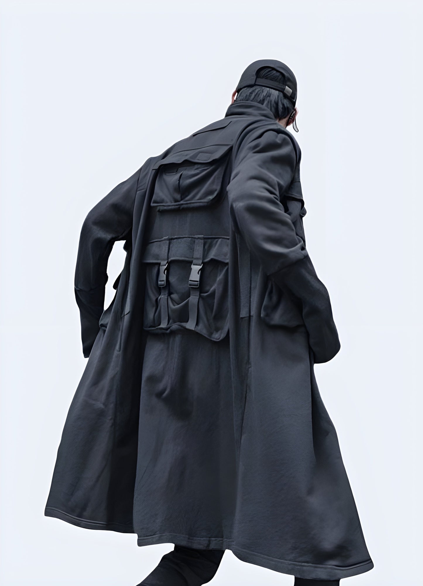 Back view of a relaxed fit techwear long coat, designed for layering and urban exploration in the Canada.