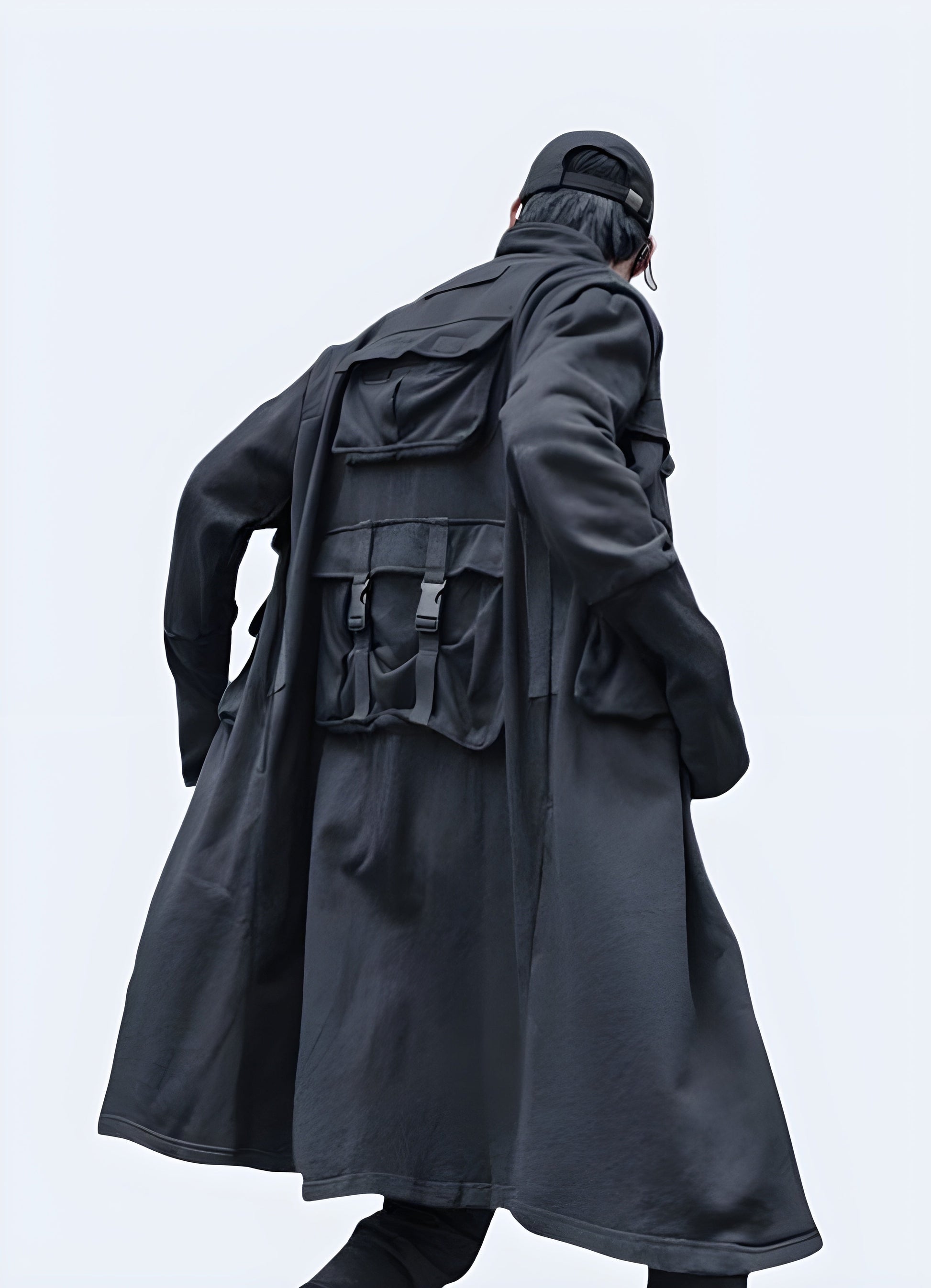Back view of a relaxed fit techwear long coat, designed for layering and urban exploration in the Canada.