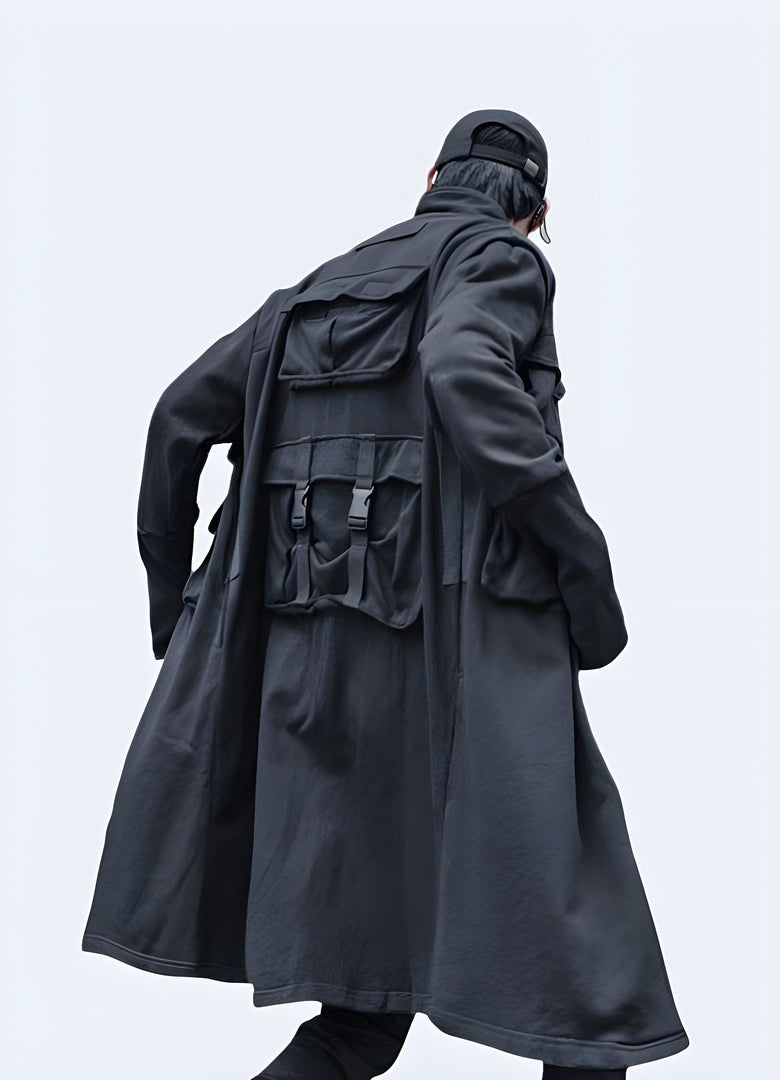 Back view of a relaxed fit techwear long coat, designed for layering and urban exploration in the Canada.