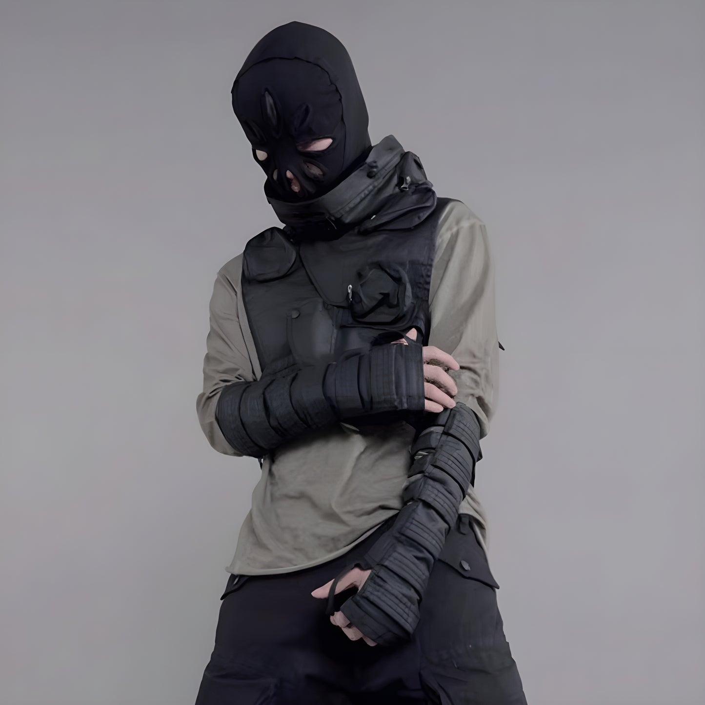 A man wearing wasteland sleeve gloves, showcasing the gloves' fit and practical design in a wasteland-inspired outfit Canada.