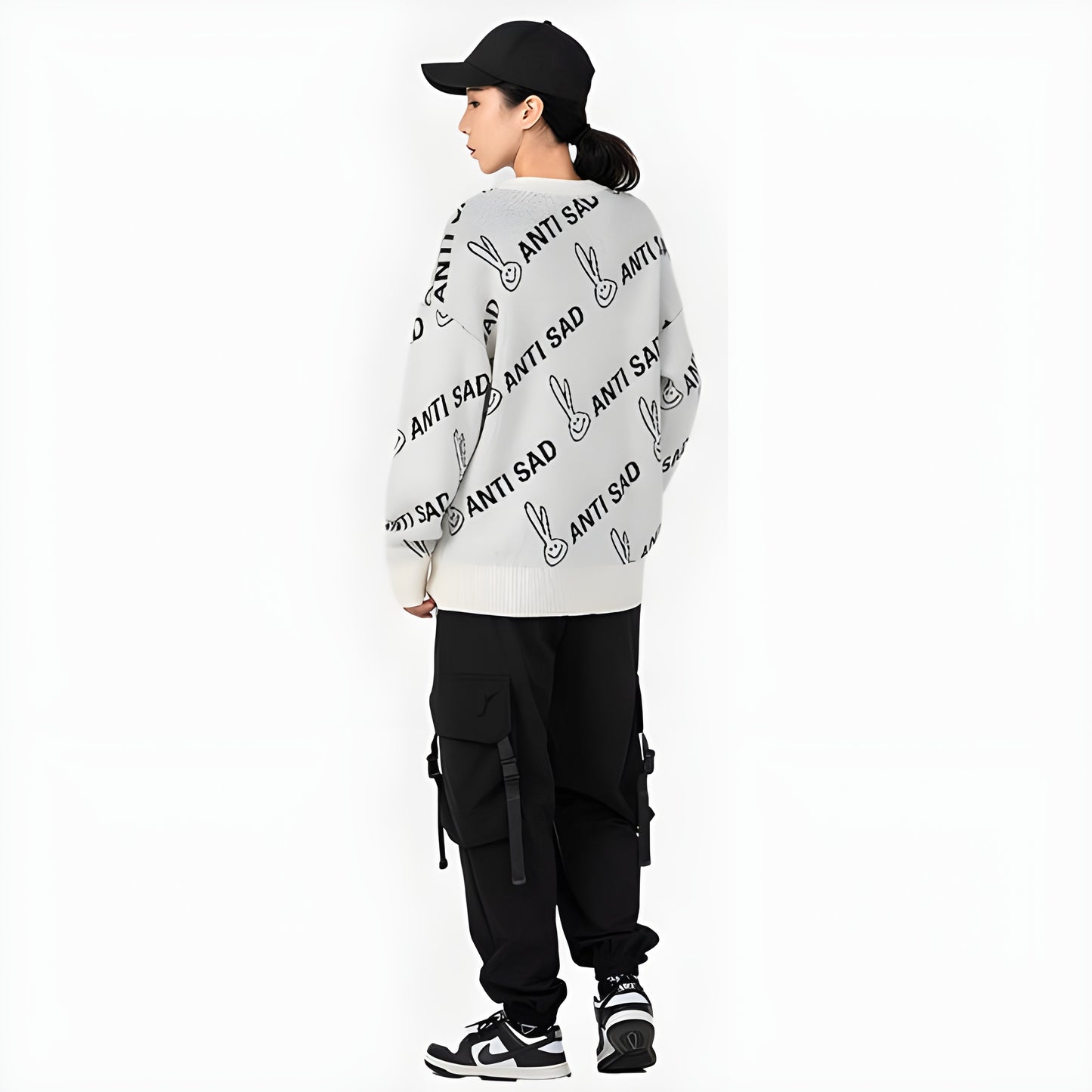 The sweatshirt is visible from the back, showcasing its simple, clean design and the prominent text.