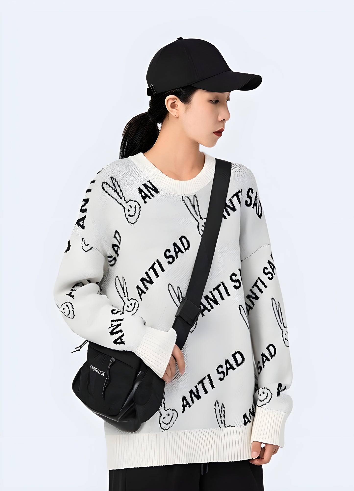 Woman wearing a white anti-sad sweatshirt, front view, in Canada. Positive and fashionable clothing for daily inspiration.