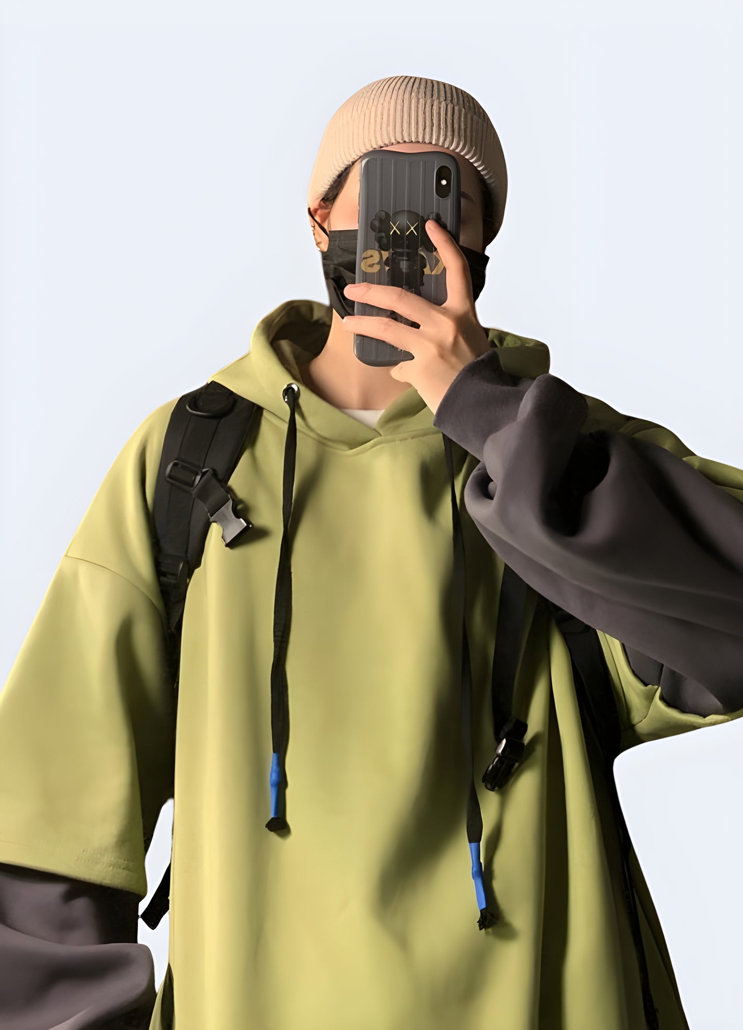 Elevate your urban wardrobe with the oversized green techwear hoodie, showcasing Korean-inspired design, front view, in Canada.