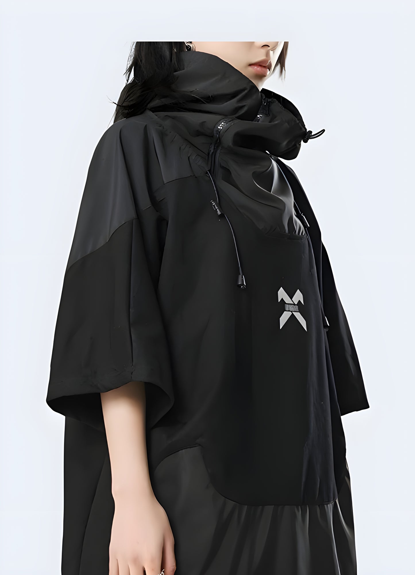 Sleeve hooded techwear pullover, highlighting its contemporary look in Canada. Ideal for trendy, everyday wear.