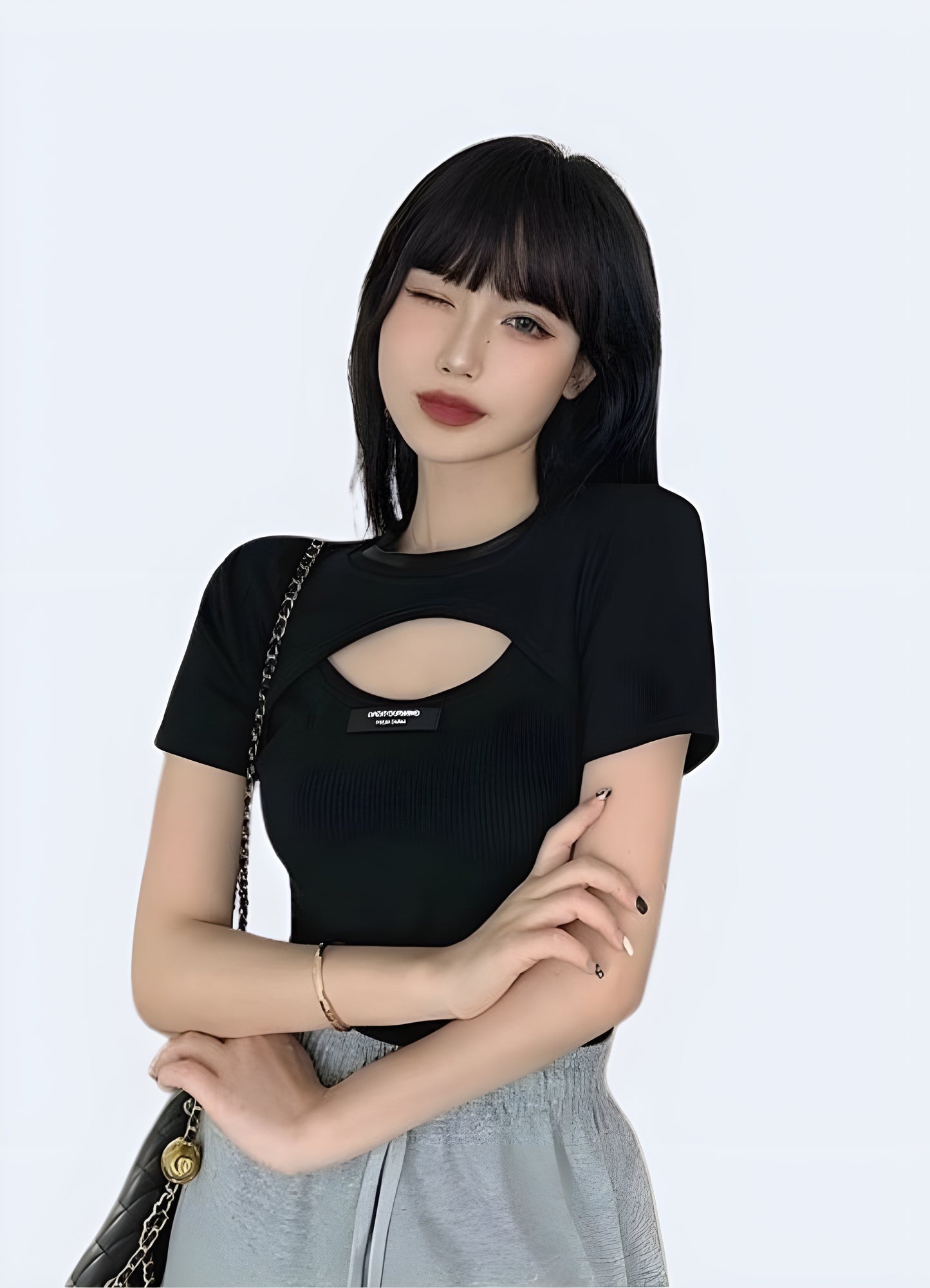 Front view of a techwear loop crop top, showing off its clean lines and attention to detail for fashion-forward women in Canada.
