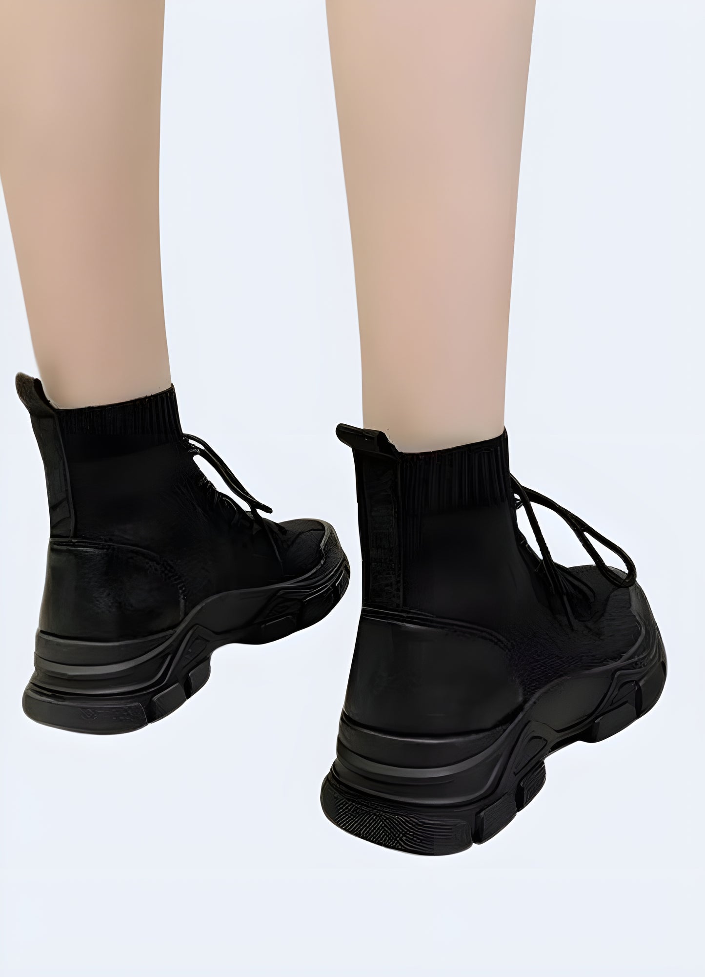 Woman wearing women's high-top ninja shoes, back view, stylish and functional design, available in Canada