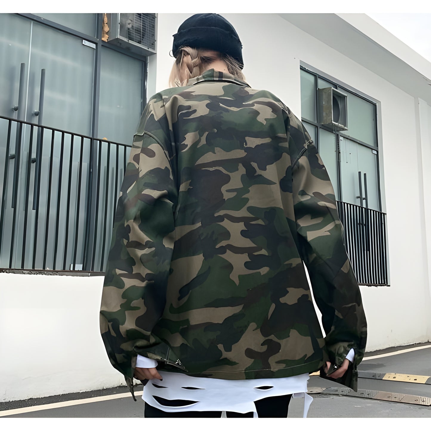 The jacket is shown in an Canada urban setting with a focus on its sleek, utilitarian features and camouflage pattern.