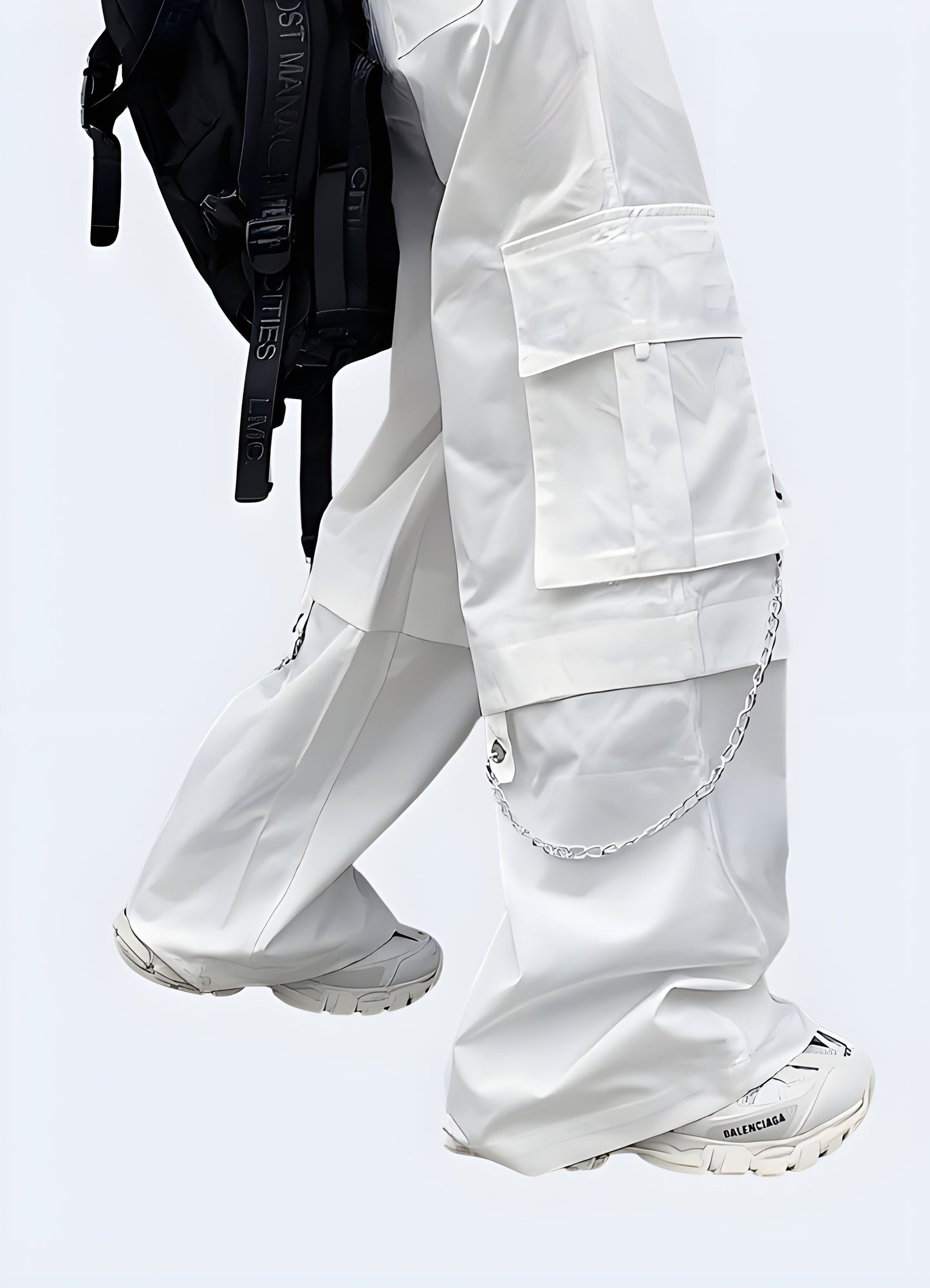 Side view of a woman wearing trendy punk cargo pants white embellished with silver chains, captured in a contemporary Canada environment, highlighting the fusion of functional and rebellious fashion elements.