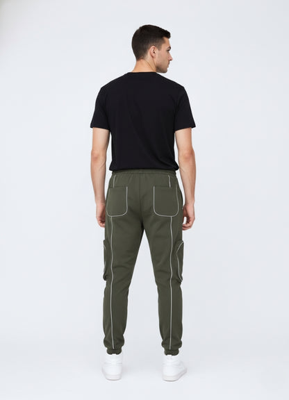 Rear view of olive green jogger-style techwear pants featuring contrast stitching, elastic cuffs, and minimalist back pocket design.
