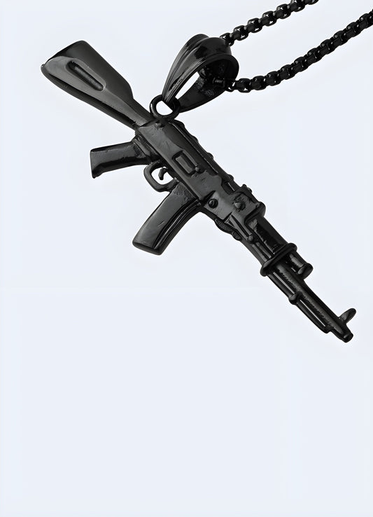 Aggressive AK-47 rifle pendant black oxide coated stainless steel Canada.