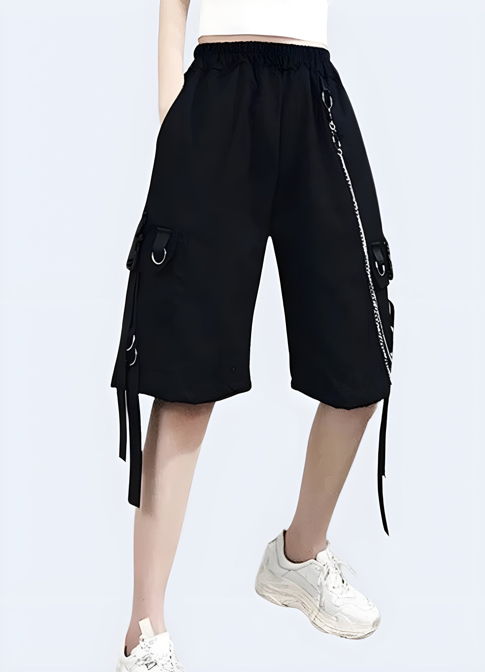 A right front view of innovative, Canada-made baggy techwear long shorts with chain, displaying the garment's cutting-edge features, relaxed silhouette, and streetwear-inspired aesthetics.