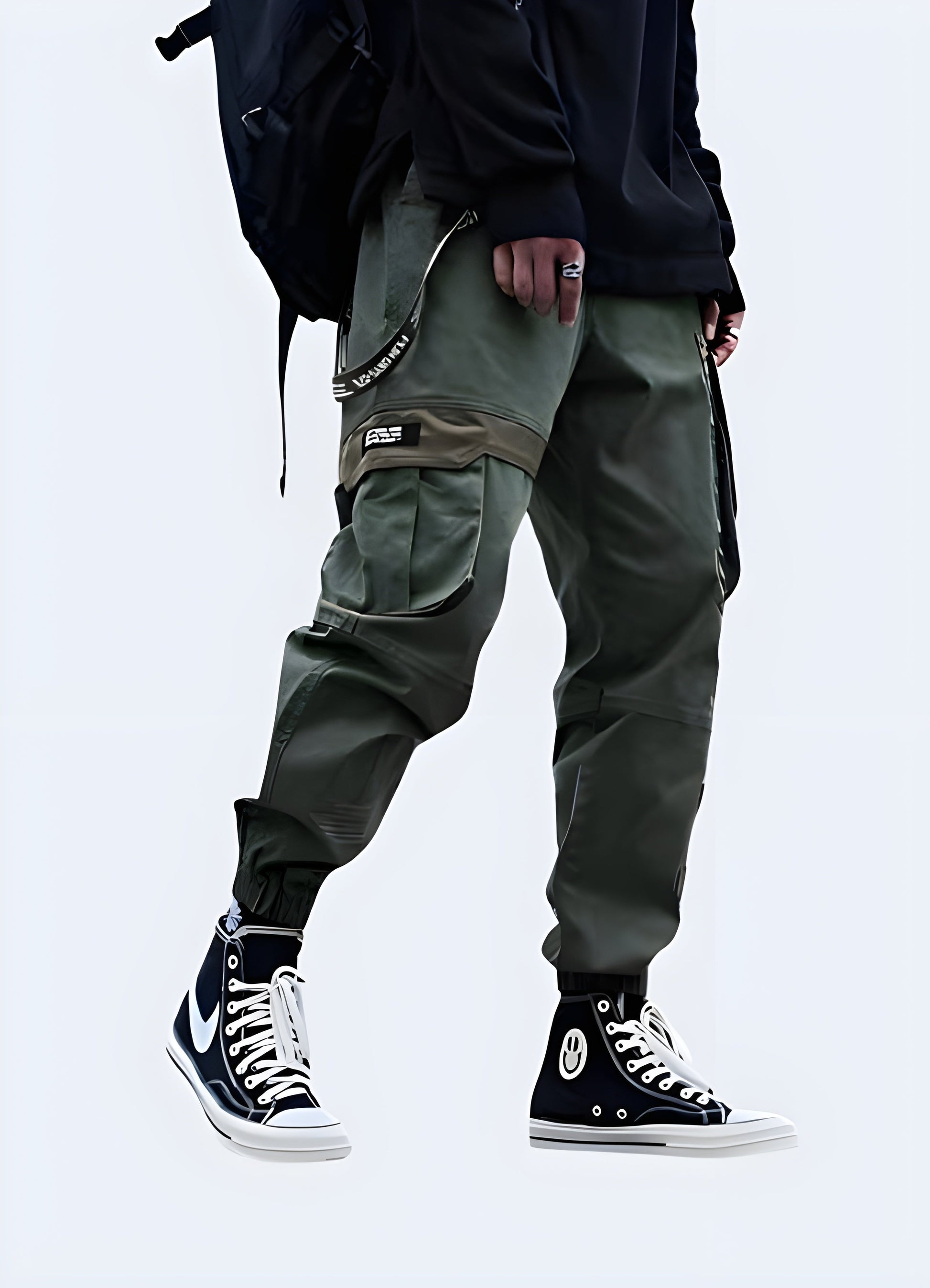 Side view of a man wearing versatile and trendy baggy techwear pants, a must-have for fashion-forward Canadians.