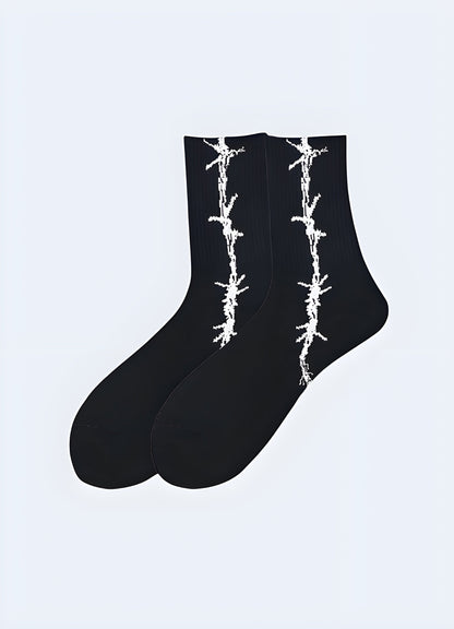 Edgy black socks with realistic barbed wire print, perfect for punk and gothic fashion enthusiasts Canada.