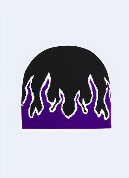 Woman wearing a beanie with flames, front view, highlighting how the fiery design adds an edgy touch to her outfit, available in Canada.