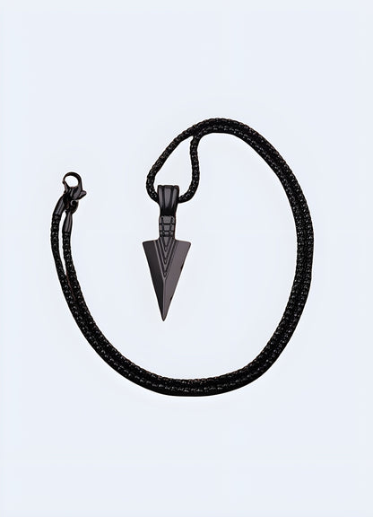 Side view of a fashionable black arrowhead necklace on a model in the Canada.