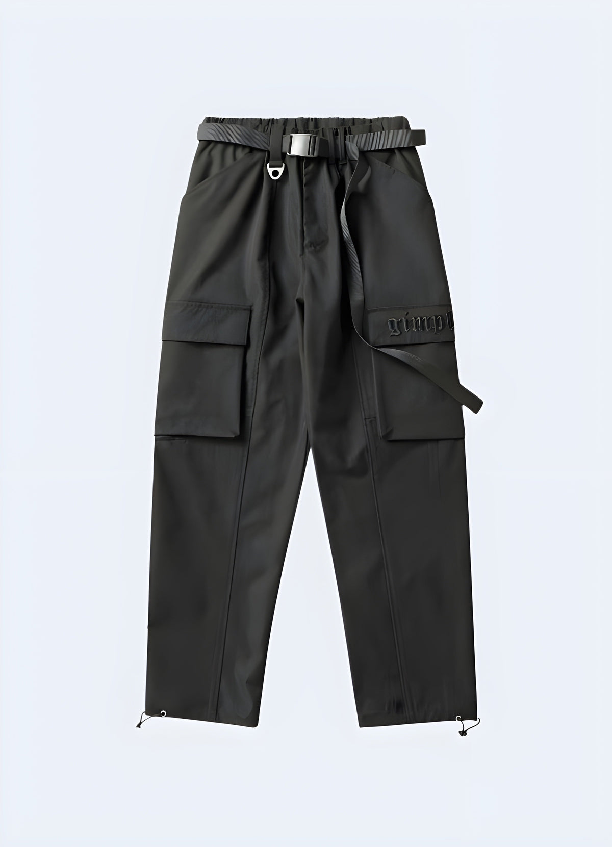 Close view of black cargo pants showing pocket flaps, stitching and hem