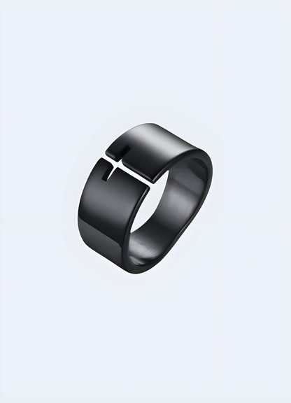 Black cross ring shown from the front and side views, emphasizing its detailed design and craftsmanship Canada.