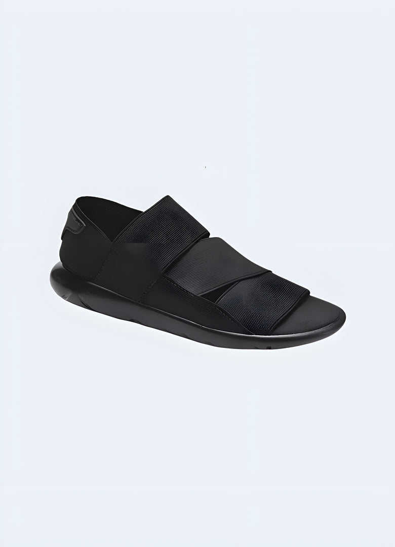 Black ninja sandals available in Canada, featuring a sleek and minimalist design perfect for modern streetwear.